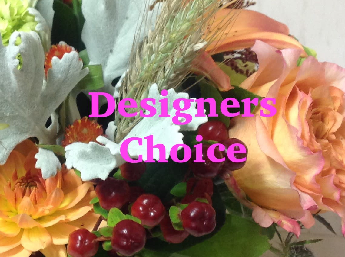 Designer's Choice Autumn - This will be a bouquet of flowers -NO VASE. Have our talented creative staff craft an Autumn bouquet for you. Flowers in the image will not necessarily be used. Any preferences can be stated in the special instructions.  