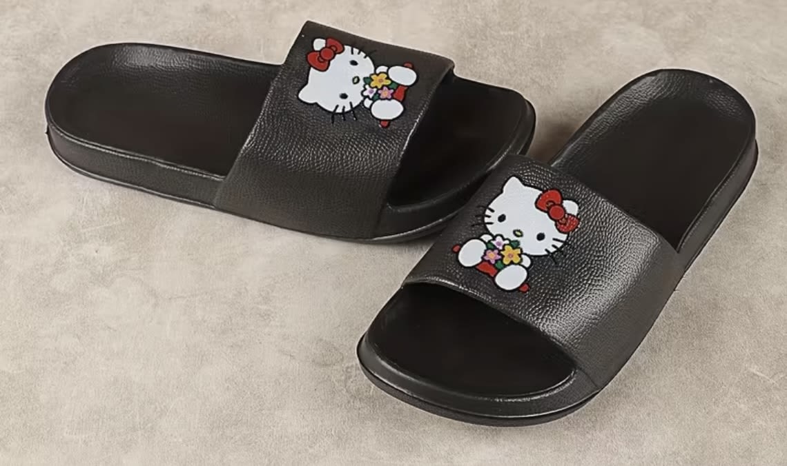 Hello Kitty  Black Sandals  - size 7.5-8 in females 