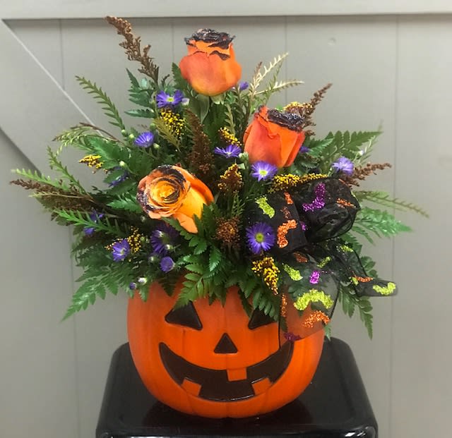 Pumpkins and roses Pumpkins and roses - Brighten up your favorite ghouls day with the pumpkin with 3 glittered roses.