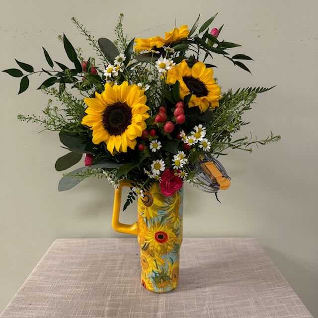 Sunflower Tumblr - Surprise your loved one with this arrangement that comes featured in a 30oz tumbler that they can keep to use daily.  Please Note: Each design is custom made and filled to value. We only use fresh product to ensure top quality so new orders are subject to substitutions.