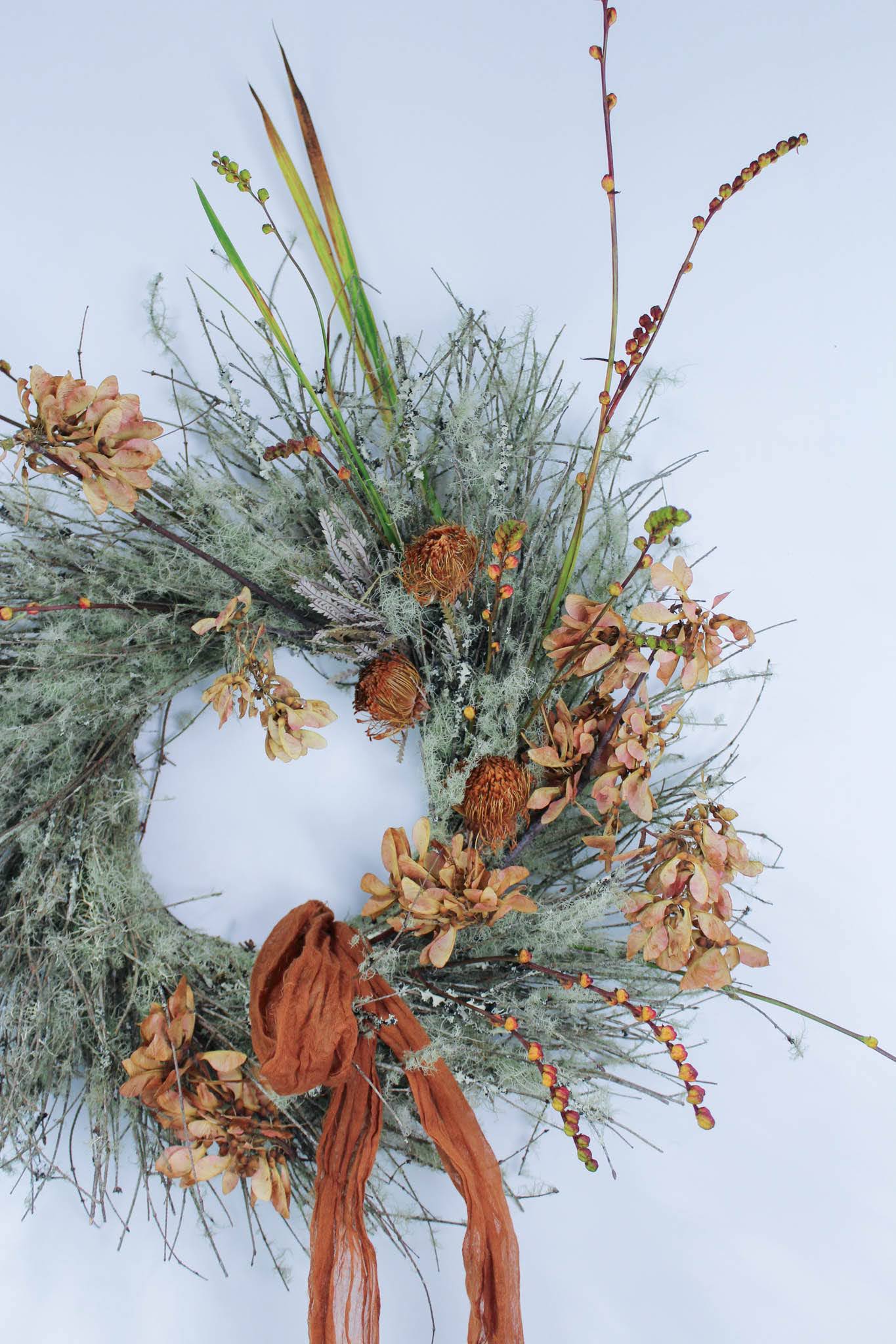 Seasonal Wreath - This long lasting wreath brings in the season with natural dried elements. Great for your door or wall!