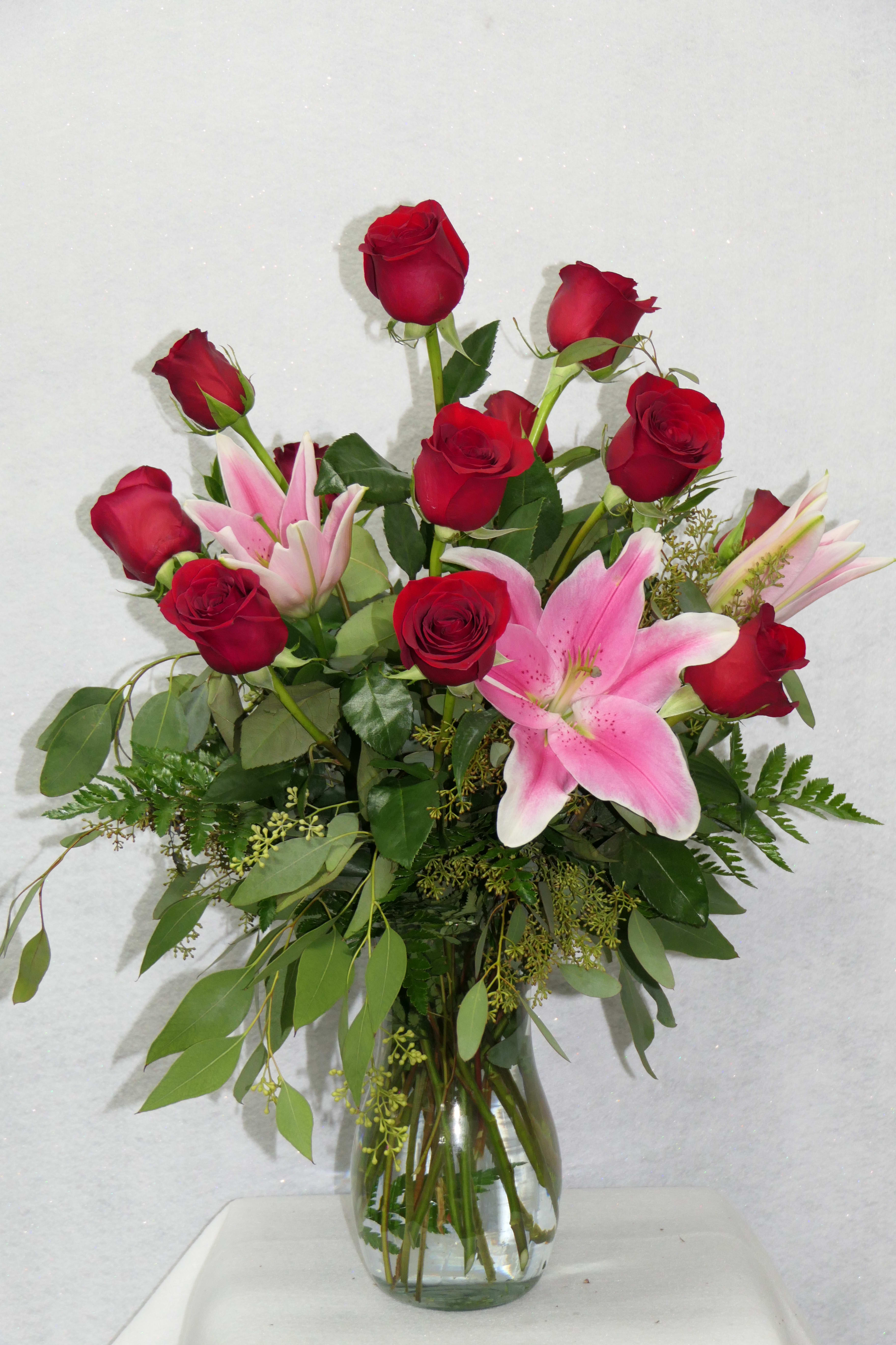 Dozen Red Roses with Stargazer Lillies - 12 stunning red roses accompanied with Stargazer lillies