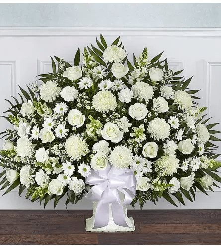 Heartfelt Tribute Floor Basket White XL - There’s a feeling of peace and tranquility that white flowers can bring to those who are grieving. Our elegant all-white floor basket, handcrafted by our caring florists with lush white blooms, is a tasteful gesture perfectly suited for the funeral home or memorial services.