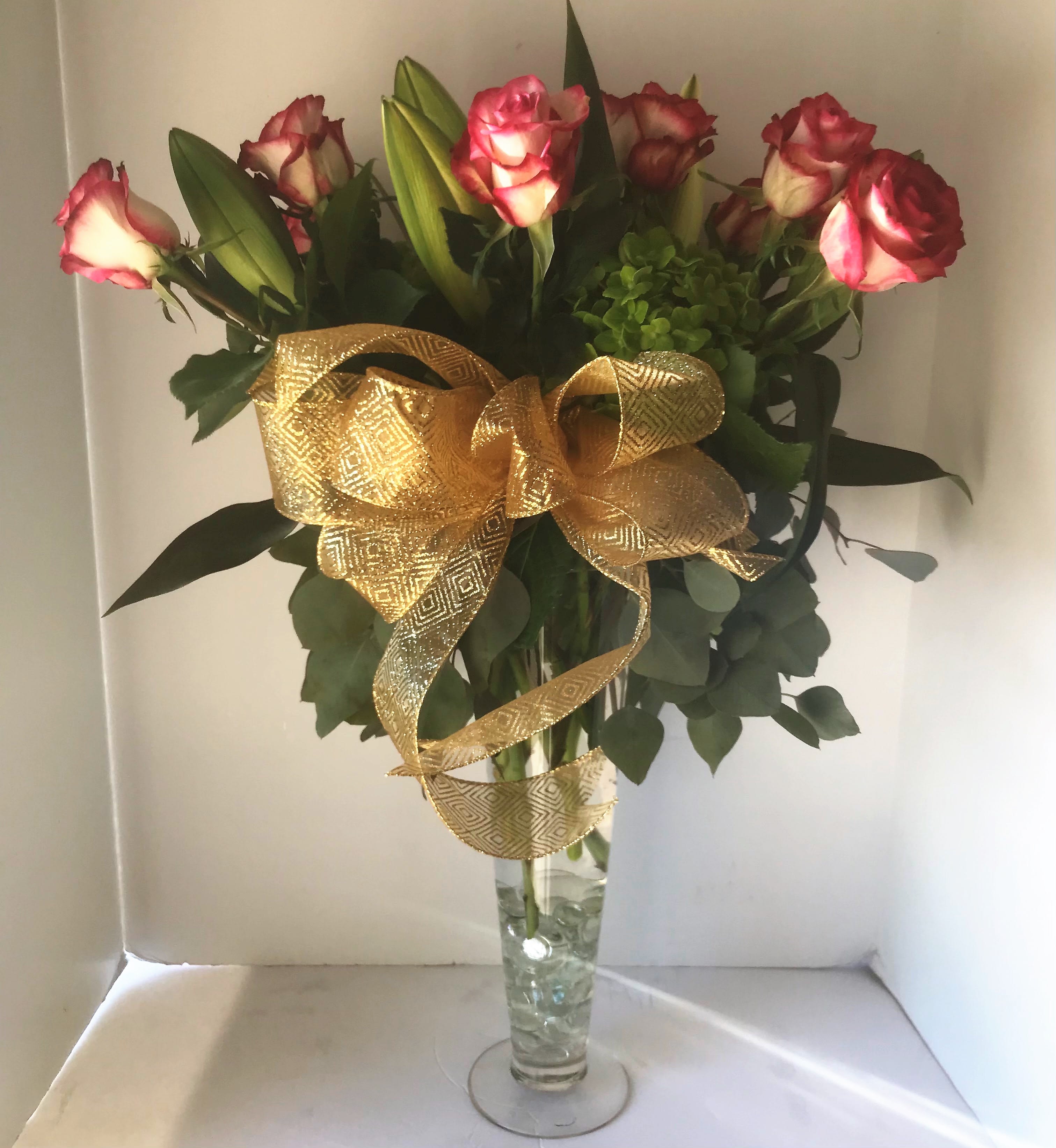 1 DOZEN ROSES - 1 dozen roses, any color, with greens and a filler flower, in a custom vase.