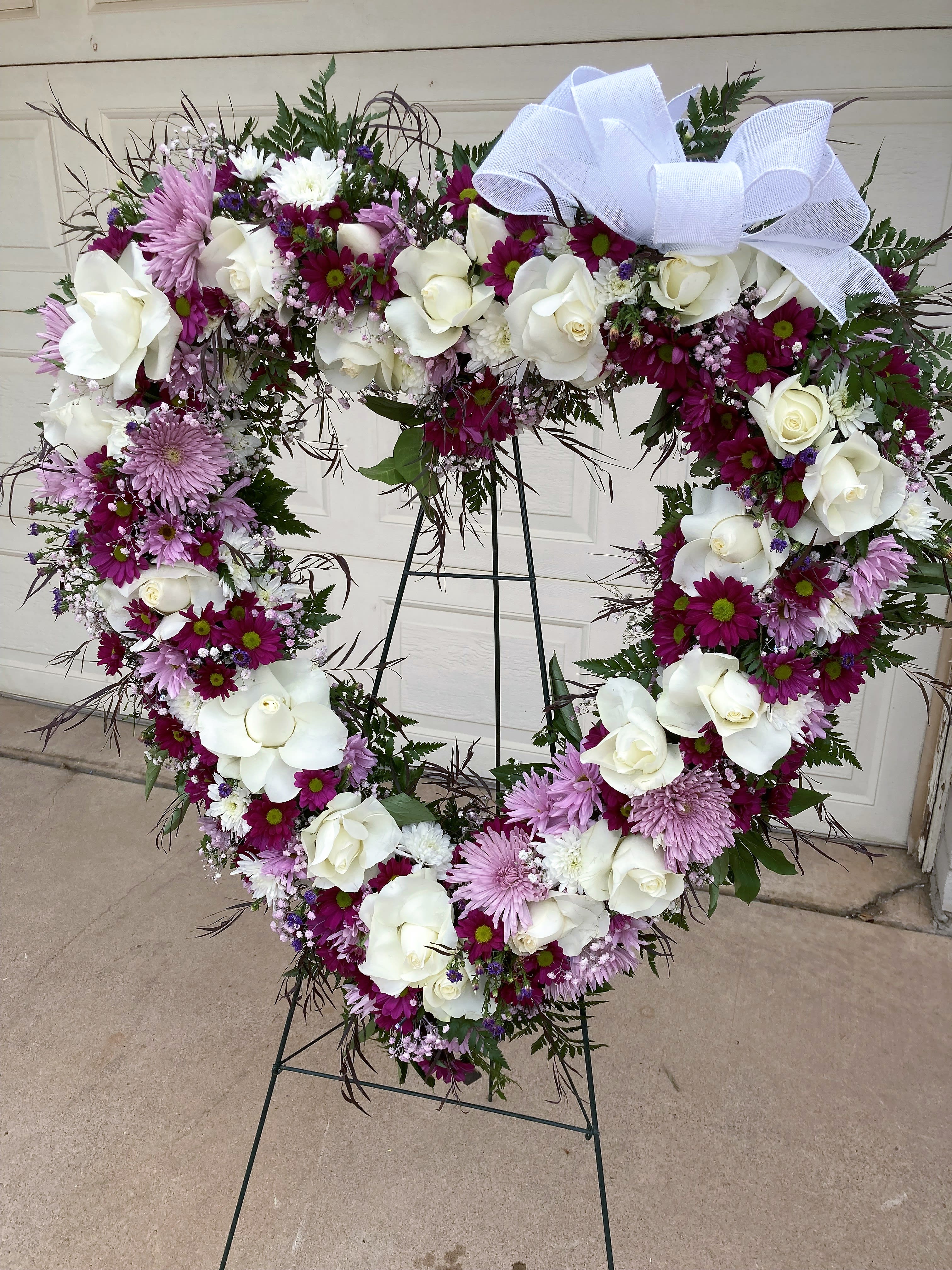 Heart of Joy - A heart wreath, created in purples, white and lavender seasonal blooms.