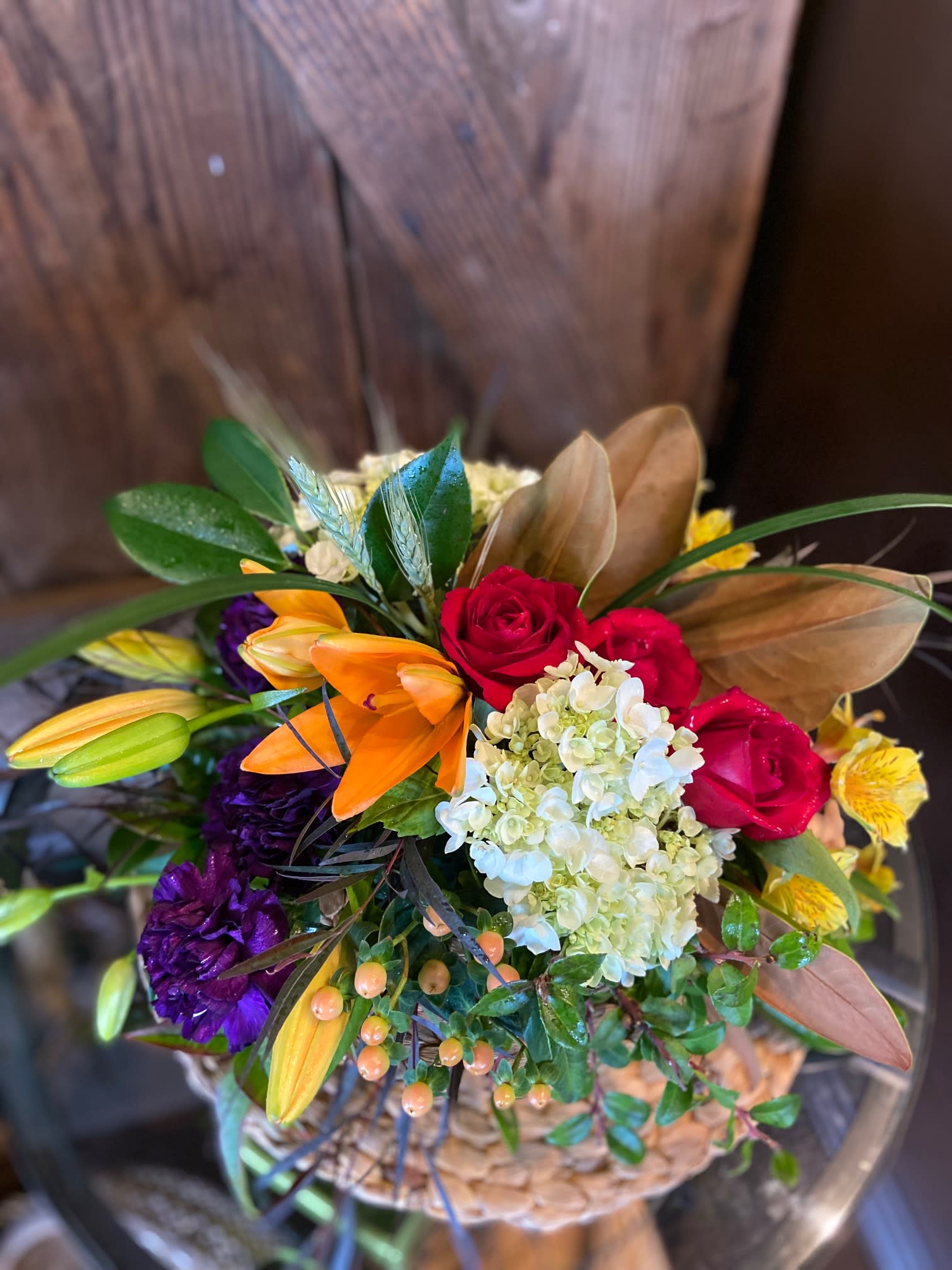 Simple Gratitude Simple Gratitude - An Assortment of Fall Blooms Arranged Tastefully in a Non Descript Container.