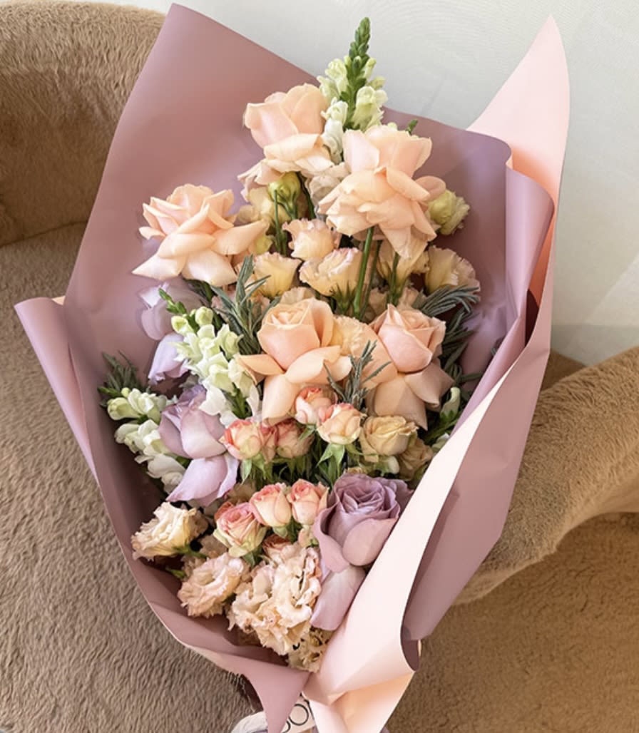 Rainbow Sherbet - Rainbow sherbet inspired bouquet wrapped in decorative paper and ribbon.