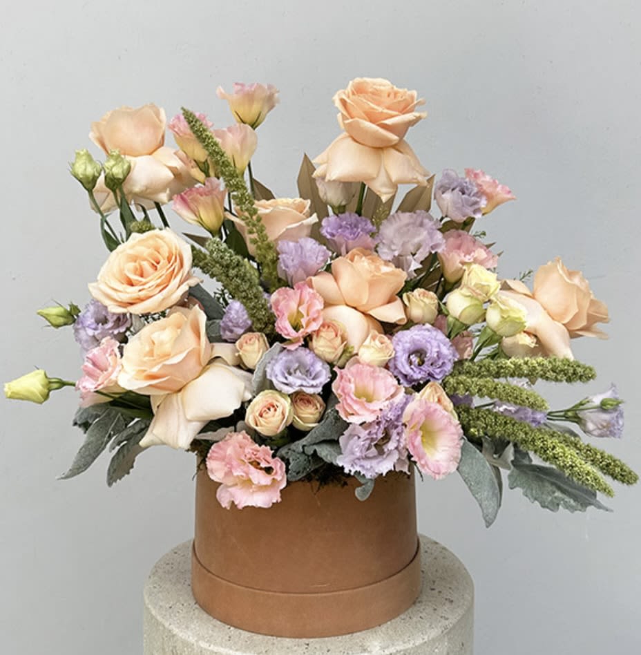 Rainbow Sherbet in a box Rainbow Sherbet in a box - Rainbow sherbet inspired box arrangement.