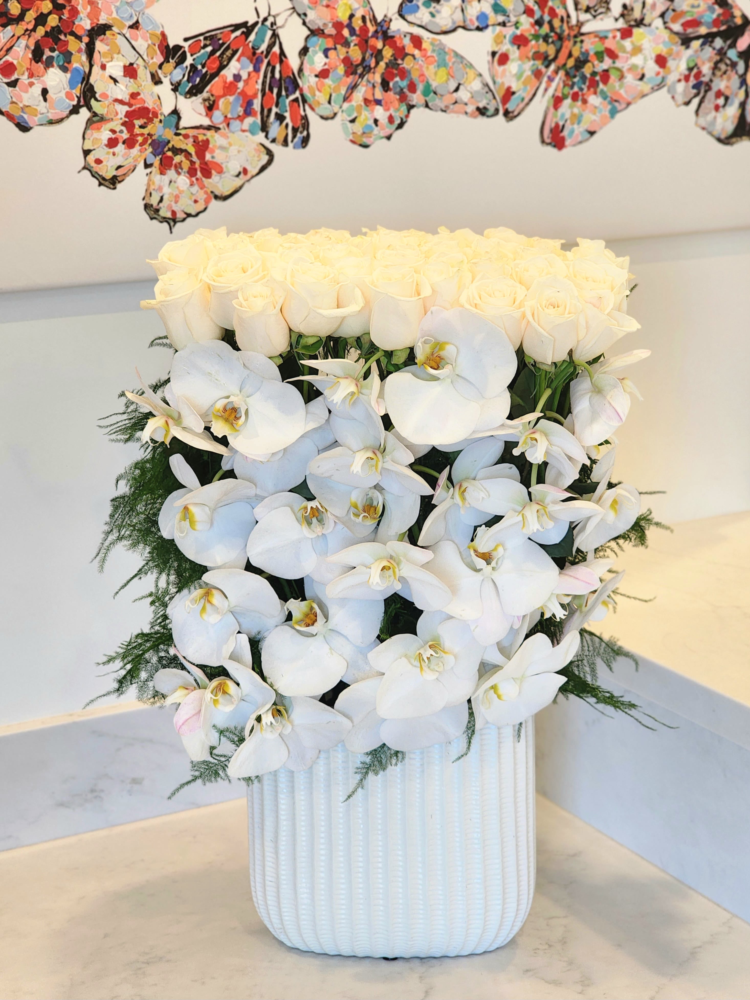 You Are Beautiful - This luxurious arrangement combines the soft beauty of blush pink roses with the timeless elegance of white orchids. A perfect gift to celebrate love, milestones, or to bring a touch of luxury into any space.  Which one do you love more — the creamy white roses or the blush pink roses?