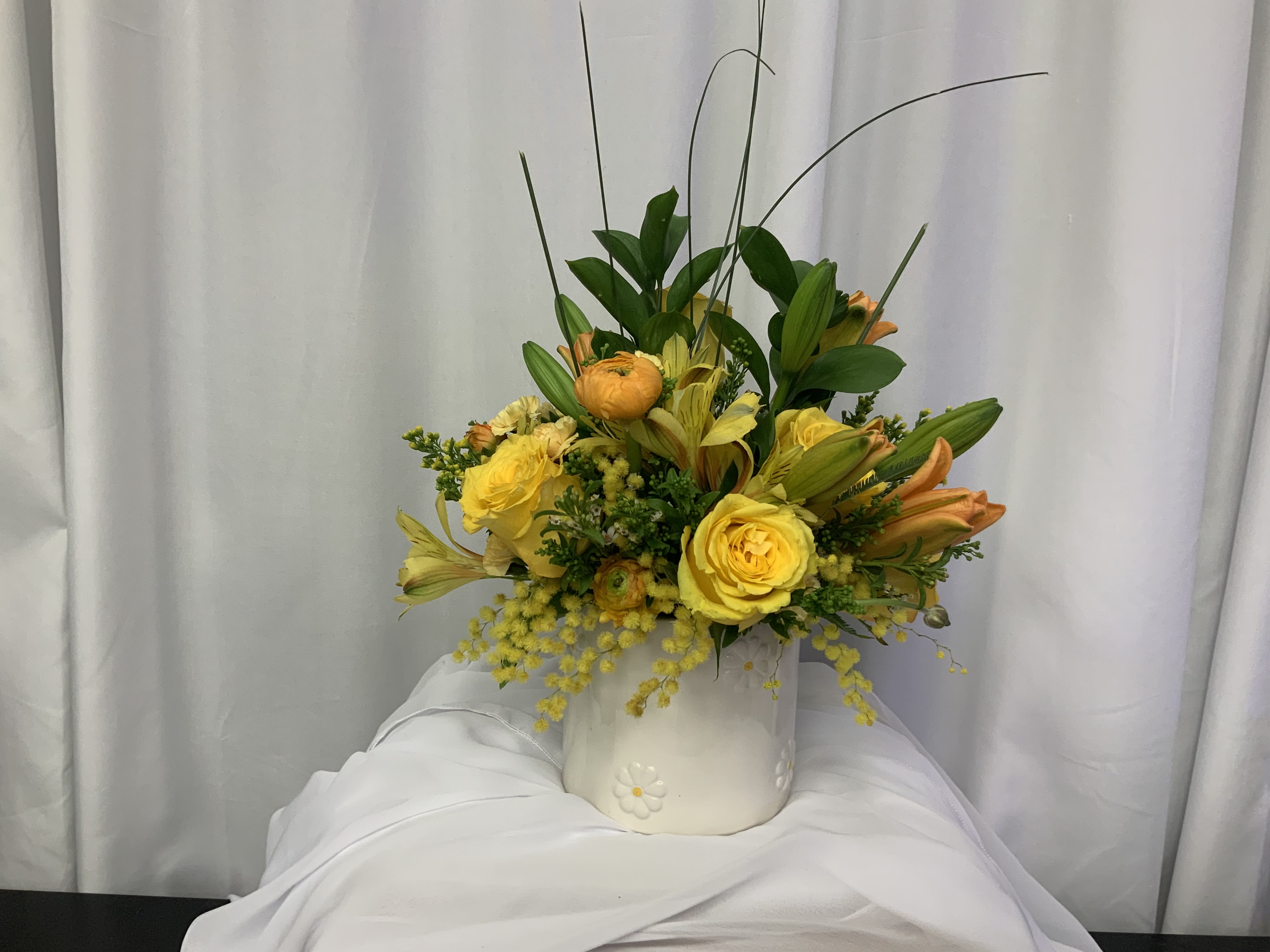 Golden radiance Bouquet - Illuminate your day with the cheerful charm of our Golden Radiance Bouquet! This stunning arrangement showcases a vibrant assortment of seasonal yellow flowers, bringing warmth, joy, and a touch of sunshine to any space or occasion. Let our Golden Radiance Bouquet brighten your world!