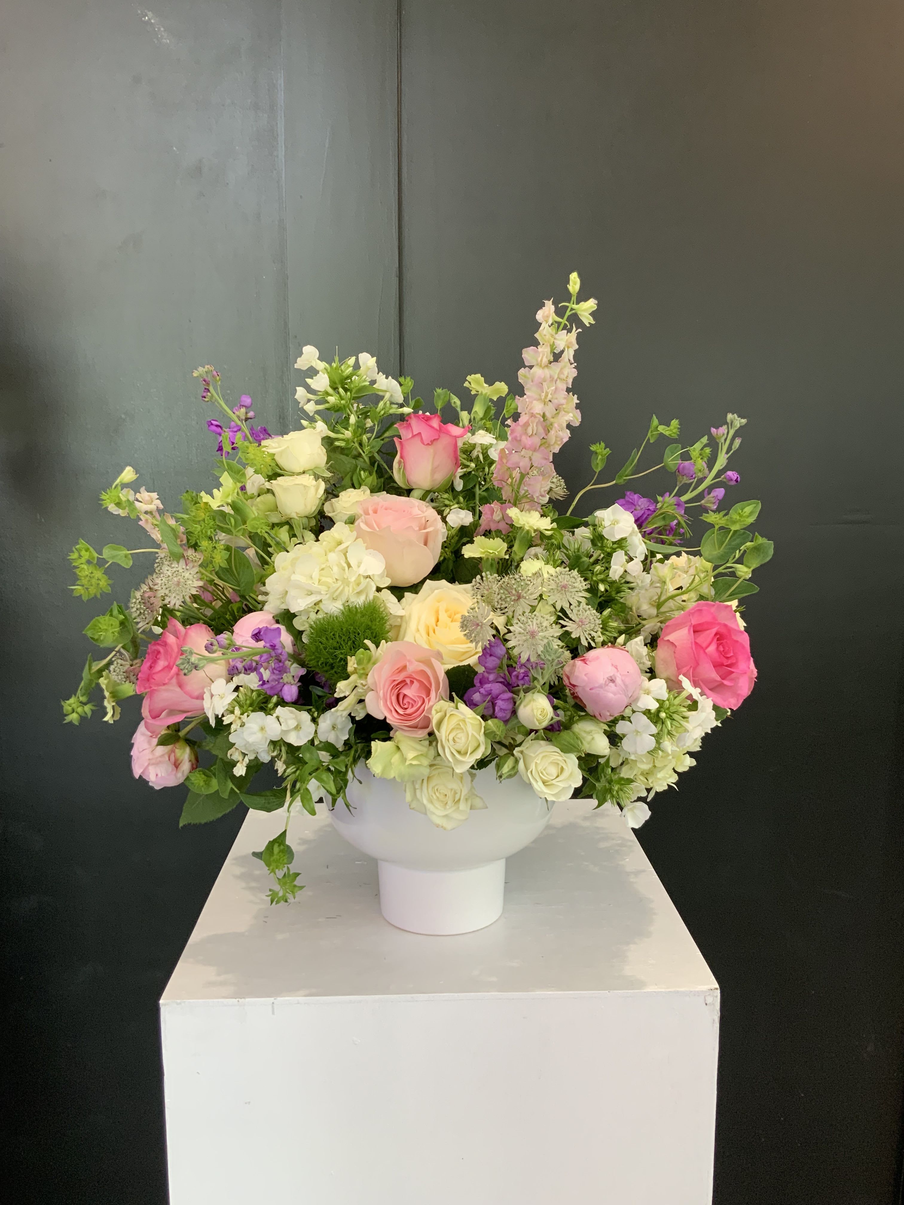 Charm bouquet  -  Experience the enchantment of an English garden with our delightful Charm Bouquet. Reminiscent of a charming cottage garden, this arrangement combines a variety of stunning flowers and lush greenery, resulting in a romantic and captivating display. The Cottage Charm Bouquet is perfect for any occasion, offering a touch of natural beauty and whimsy that's sure to bring joy to your loved one.