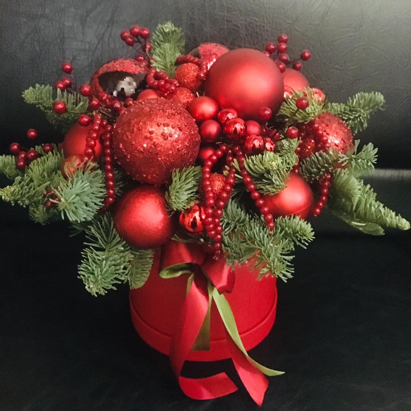 Red Christmas.  Red Christmas.  - Red Christmas. Red berries, red balls and green spruce branches. They create volume and texture in the composition and are also associated with the Christmas theme. Berries and balls add shine and contrast, and spruce branches add freshness and aroma.