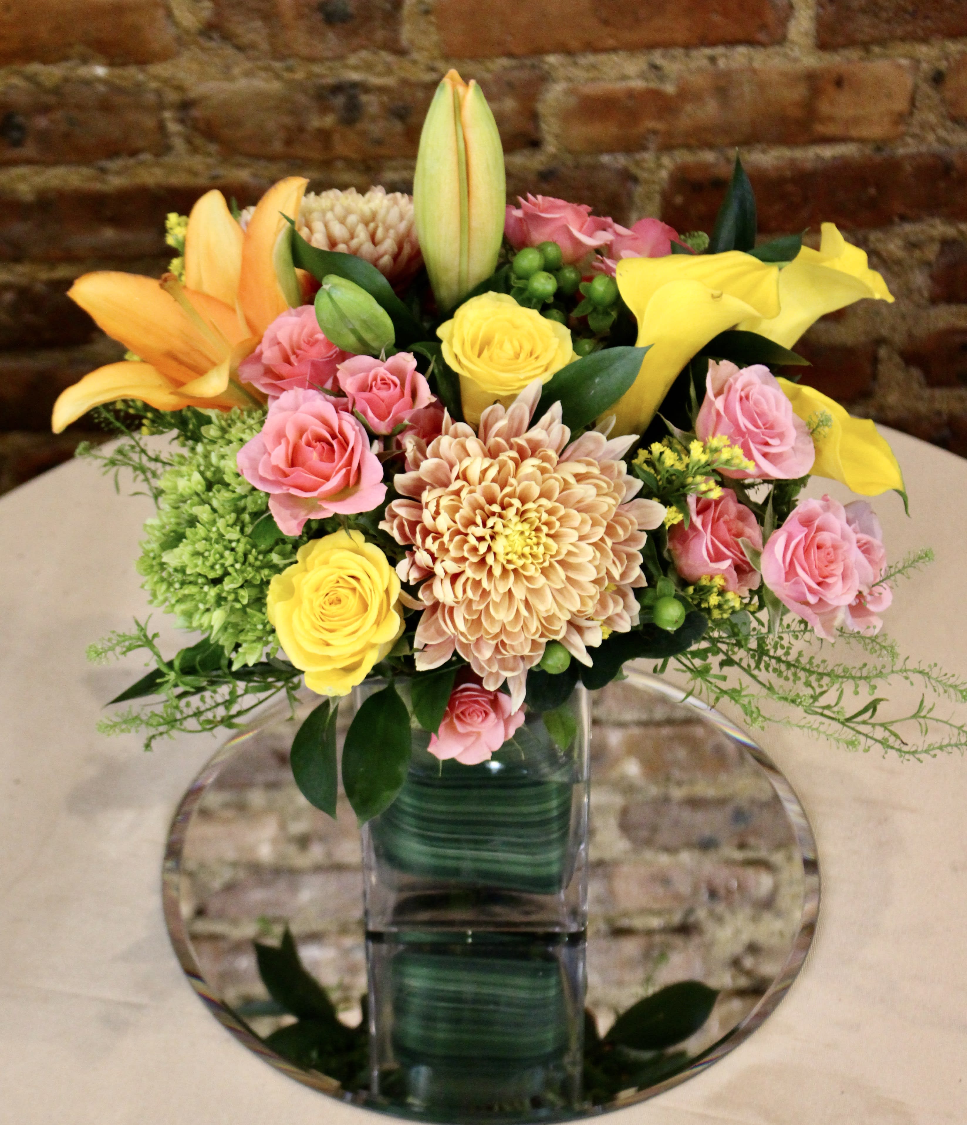 The Best Day Bouquet  - The Best Day Bouquet is ready to create a moment your recipient will always remember! This instant mood booster is the perfect combination of bright, bold colors and gorgeous florals.Handcrafted in a clear glass vase, this fresh flower arrangement is made just for you to help you send your warmest birthday or get well wishes to your favorite friends and family.  Orientation: All-Around All prices in USD ($) Standard (Shown), Deluxe , Premium