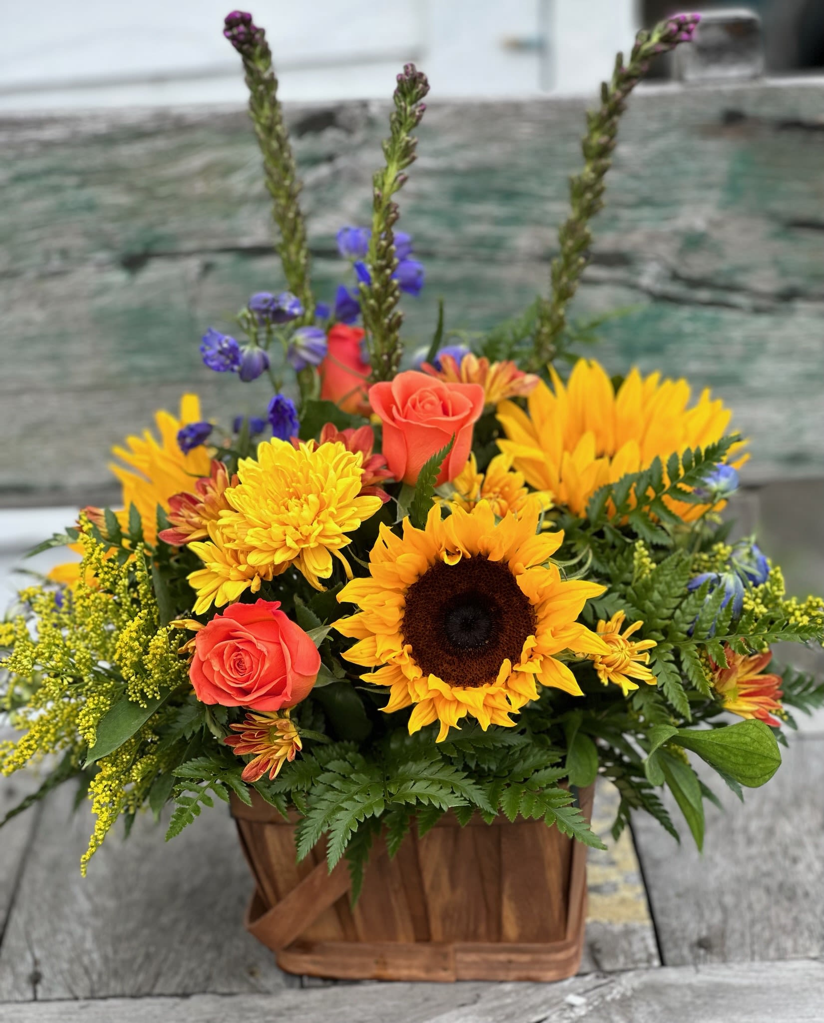 Fall at the Beach Basket - Basket of flowers for summer. Beautiful blues, sunflowers, and other earthy tones that remind you of a fall  garden at the beach. 