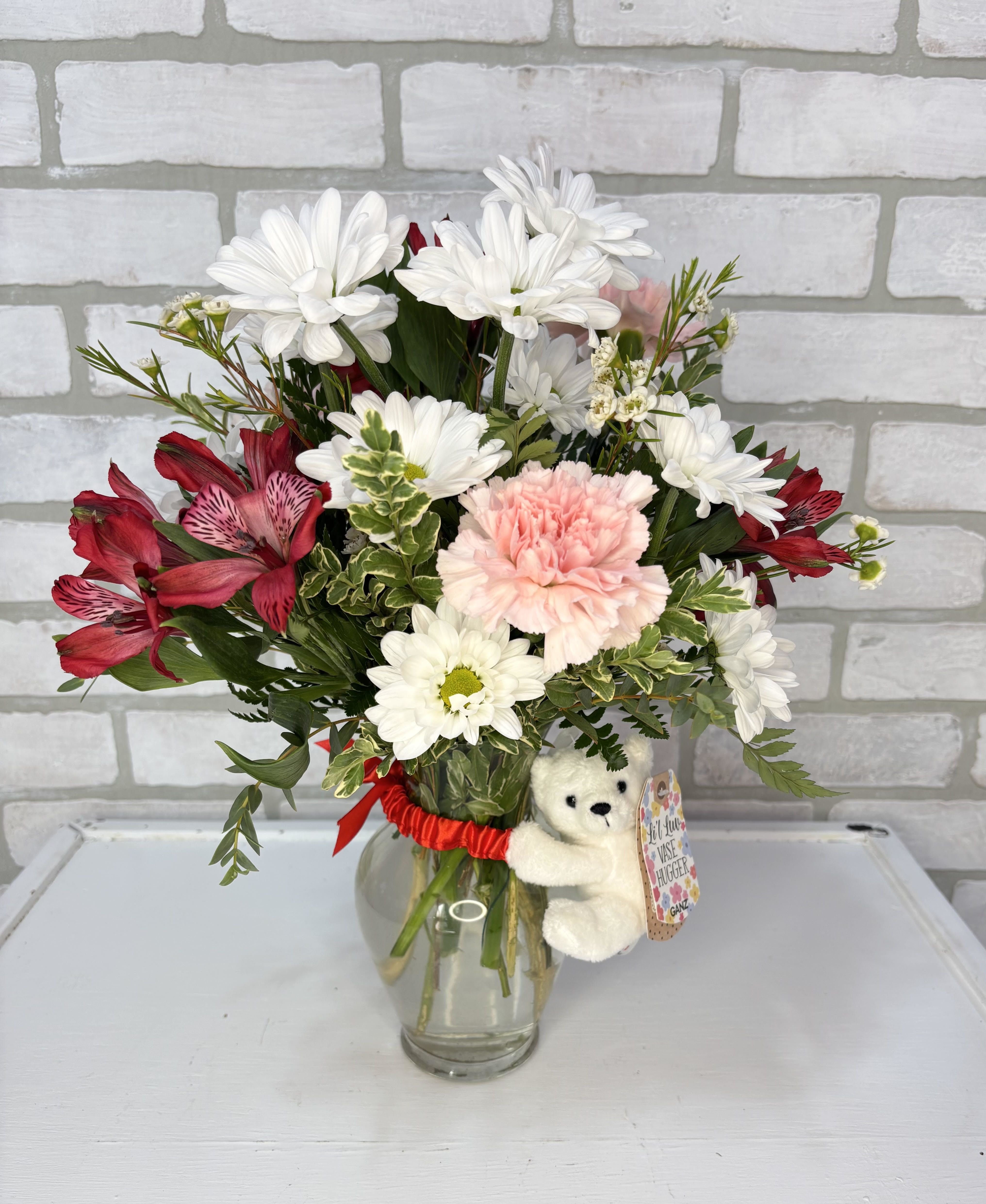 Beary Lovely - A little bear hugging a beautiful mix of flowers. 