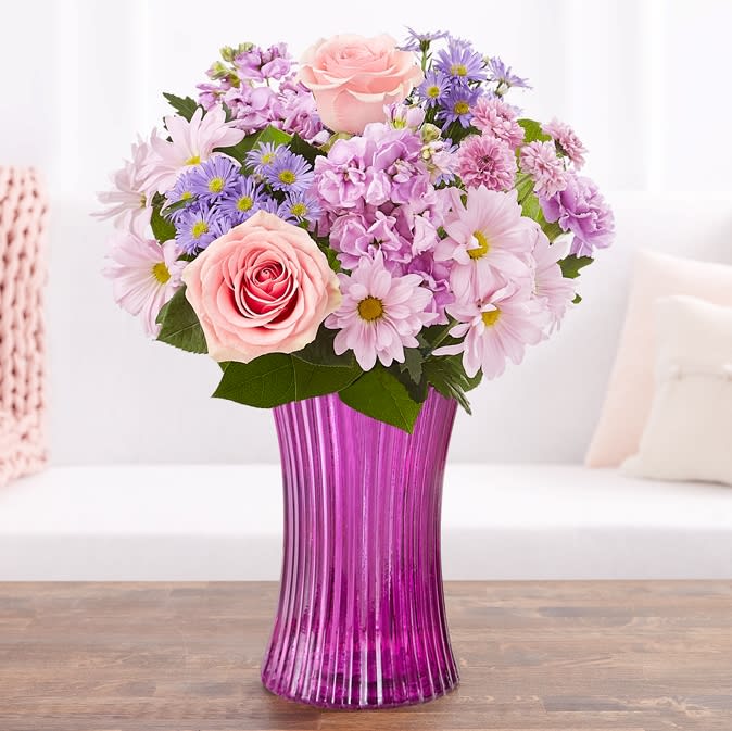 Daydreams Bouquet Daydreams Bouquet - Just like a daydream. Our delightful lavender bouquet is gathered with accents of pink and lush greenery in our striking fluted violet gathering vase. Designed in vintage pressed glass with ribbed detailing, it captures the rich beauty of the blooms, along with the thoughtfulness of your sentiment.