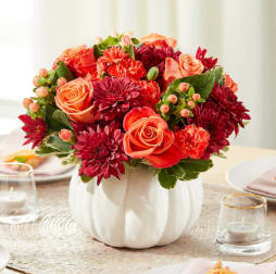 Harvest Breeze Pumpkin Bouquet Harvest Breeze Pumpkin Bouquet - As refreshing as a crisp autumn breeze, this bouquet delights the senses with warm hues of burnt orange and deep red blooms.