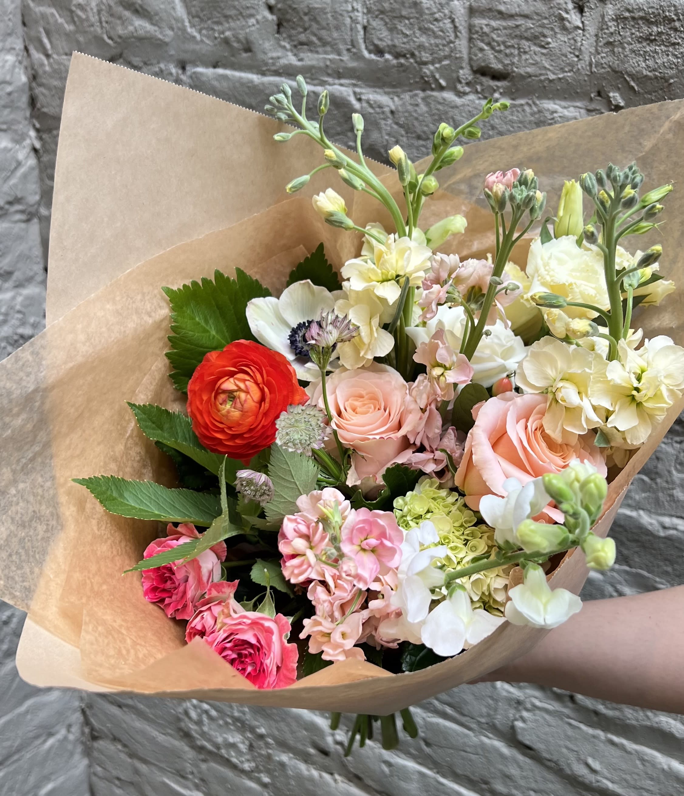 Fresh Hand-wrapped Bouquet - Designer's Choice - Already have a vase waiting to be filled?  Our hand-wrapped bouquets are the perfect answer!  If you have a color preference, simply let us know and our designers will create a beautiful one-of-a-kind wrap for you in the palette of your choice.