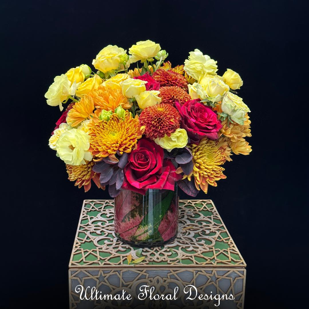 Scarlet Panther Elegance Scarlet Panther Elegance - A luxury floral design featuring Red Panther roses and butterfly ranunculus, accented with seasonal blooms for timeless elegance. Handcrafted by Ultimate Floral Designs with same-day flower delivery available throughout the DMV area—including Washington, D.C., Maryland, and Virginia. Perfect for weddings, anniversaries, corporate events, and special celebrations.