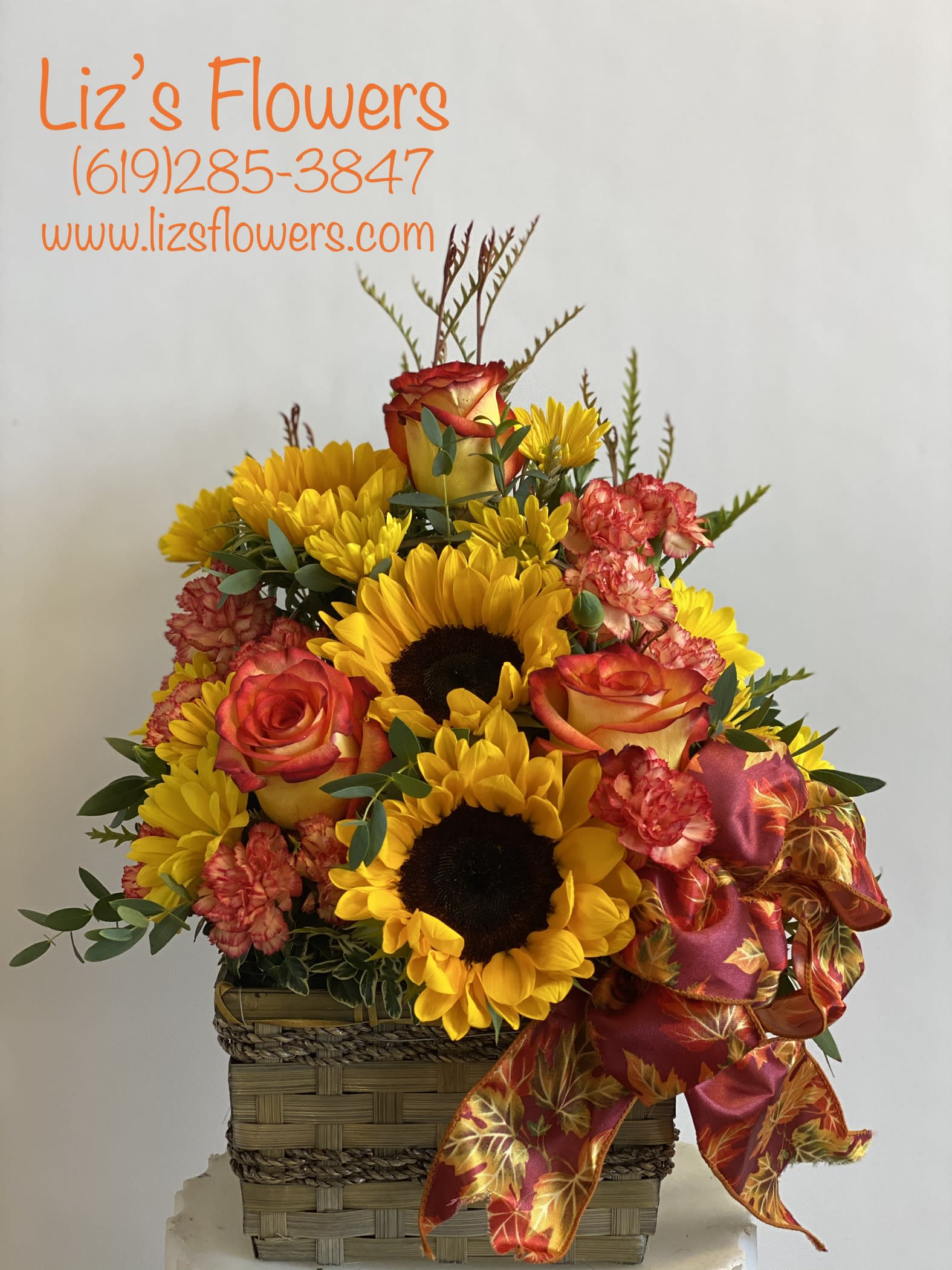 Autumn Sunflower Basket  - Basket of fall color flowers. 