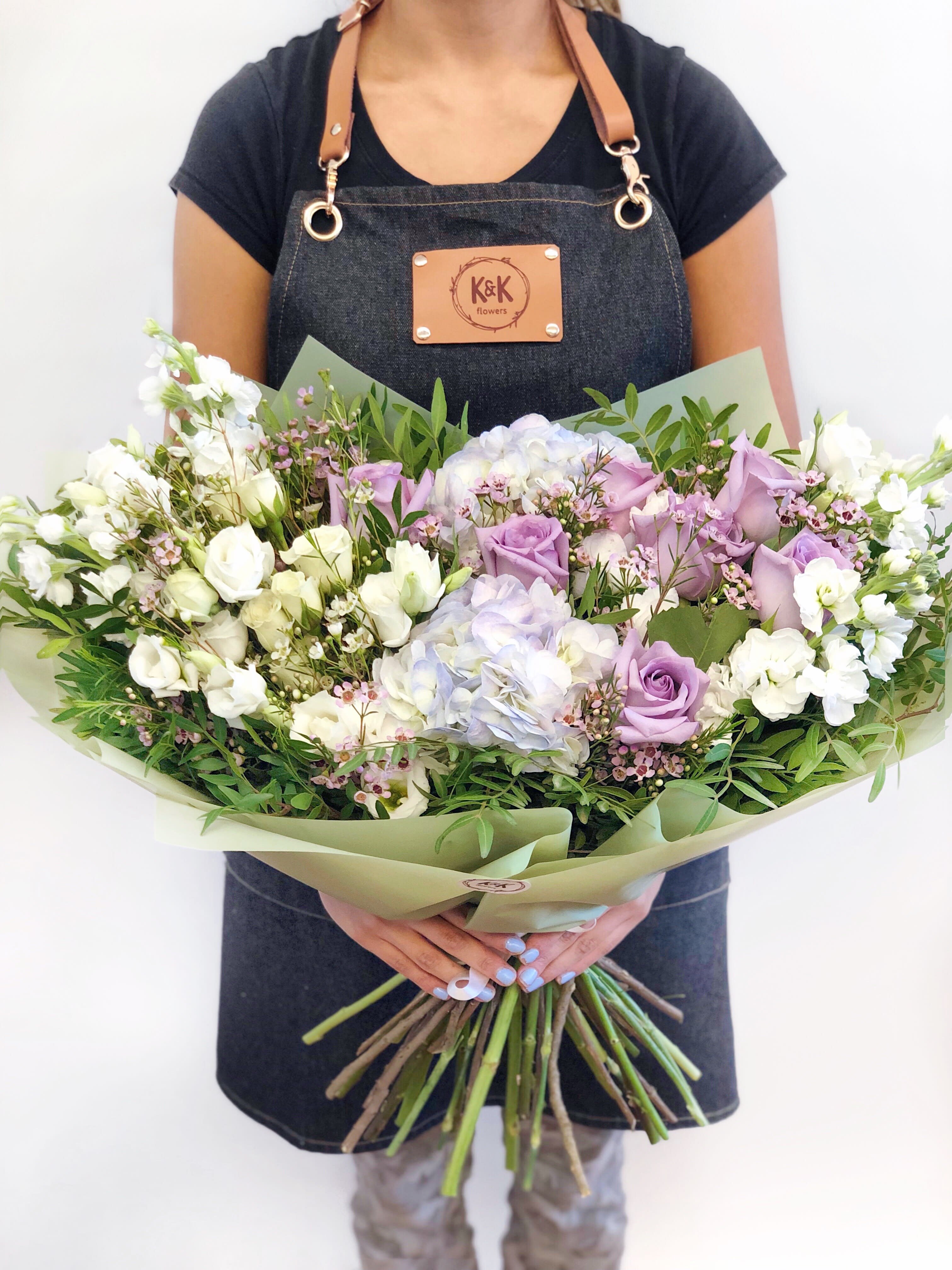 Large Loose Style Bouquet Lavender And White Large Loose Style Bouquet Lavender And White - Mixed flowers bouquet, from romantic and gentle to an edgy and interesting look. All bouquets come without a vase. You can choose a vase at the add-on section