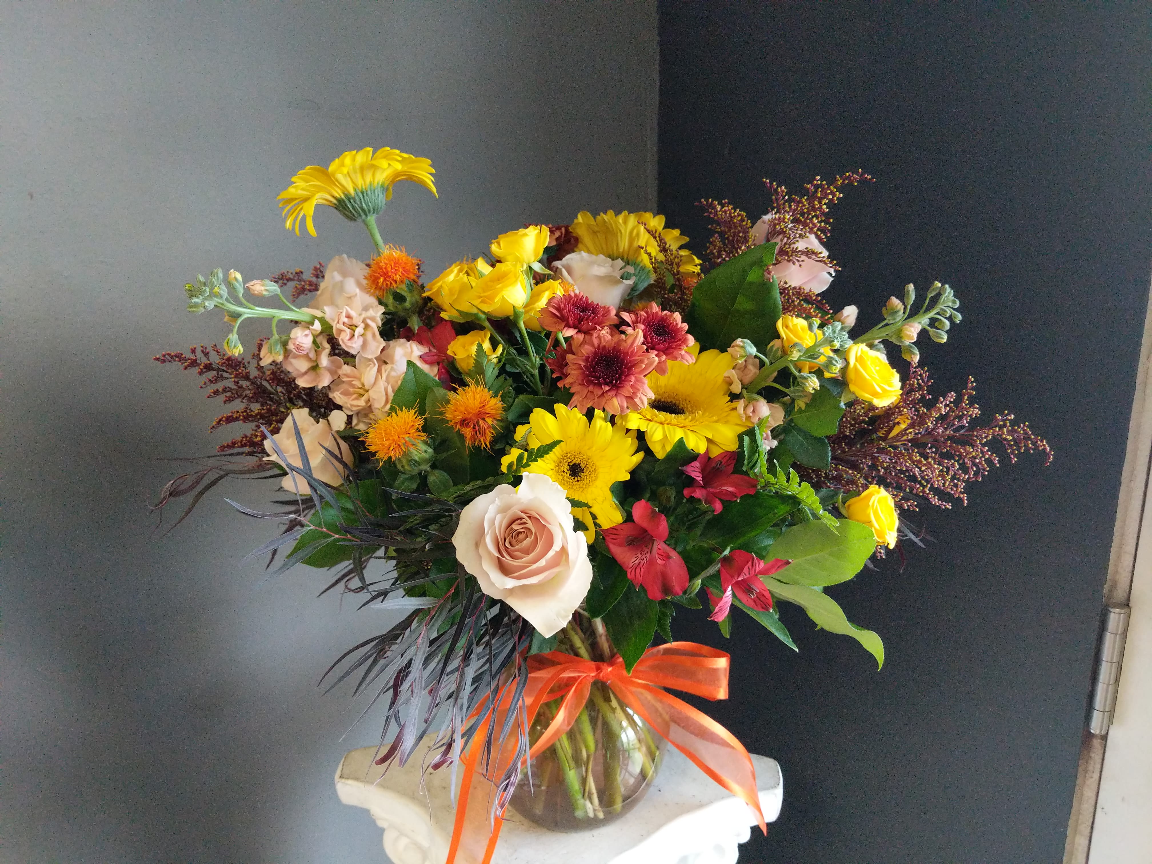 # 142 Fall Floral Arrangement - A beautifully selected bunch of the freshest flowers in a vase uniquely arranged by hand.