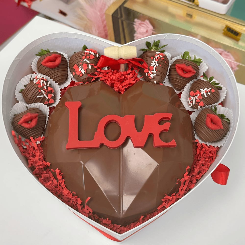 Breakable Chocolate Heart Love  - Breakable Chocolate Heart Love – Romantic Gift for Anniversary, Weddings &amp; I’m Sorry Moments  Surprise your loved one with our Breakable Chocolate Heart gift box, the ultimate romantic anniversary gift with chocolate, created to express love, passion, and unforgettable emotions. Crafted with premium chocolate heart with LOVE letters, this interactive surprise includes a small hammer so you can hide inside a personalized anniversary message, engagement ring, money surprise, or a special photo gift . Perfect for celebrating an anniversary with your girlfriend, boyfriend, husband, or wife, this romantic chocolate heart for couples is also ideal as a wedding gift box with chocolate heart, a sorry gift for her, or even a romantic gift for him when you want to win back love, ask for forgiveness, or create an unforgettable romantic surprise with chocolate strawberries.  This heart-shaped chocolate is more than a gift – it’s a romantic surprise box for anniversaries, weddings, proposals, Valentine’s Day, or “I’m sorry” moments, delivering love wrapped in sweetness    Breakable Chocolate Heart with LOVE letters  Interactive surprise: add your own small gift inside (money, jewelry, photo, love note)  Perfect for anniversaries, weddings, engagements, or forgiveness gifts  Designed for him &amp; her – a luxury way to celebrate romance