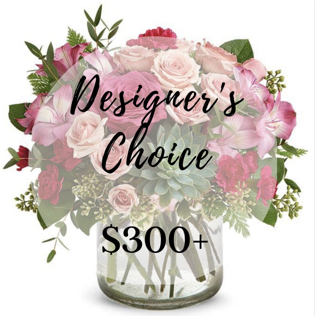 Designer's Choice +300 Designer's Choice +300 - Hand-crafted designs with the freshest seasonal flowers in a clear glass vase handpicked by our talented designers!