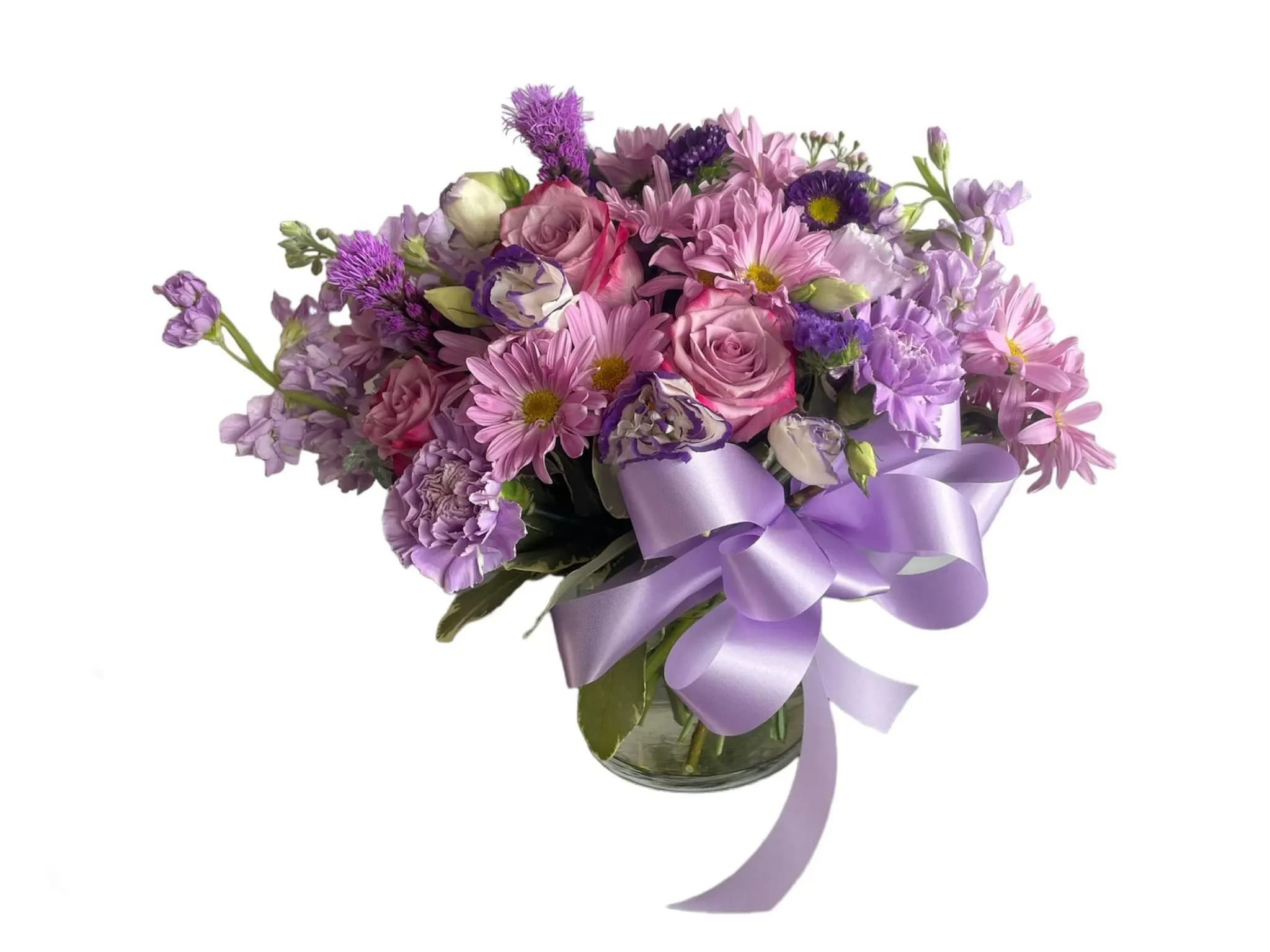 Lavender Dreamscape Lavender Dreamscape - In this floral arrangement, lavender and purple unite to create a masterpiece that captures the essence of elegance, serenity, and sophistication. It is a gift that not only delights the eyes but also soothes the spirit, reminding us of the timeless beauty that can be found in nature's embrace.