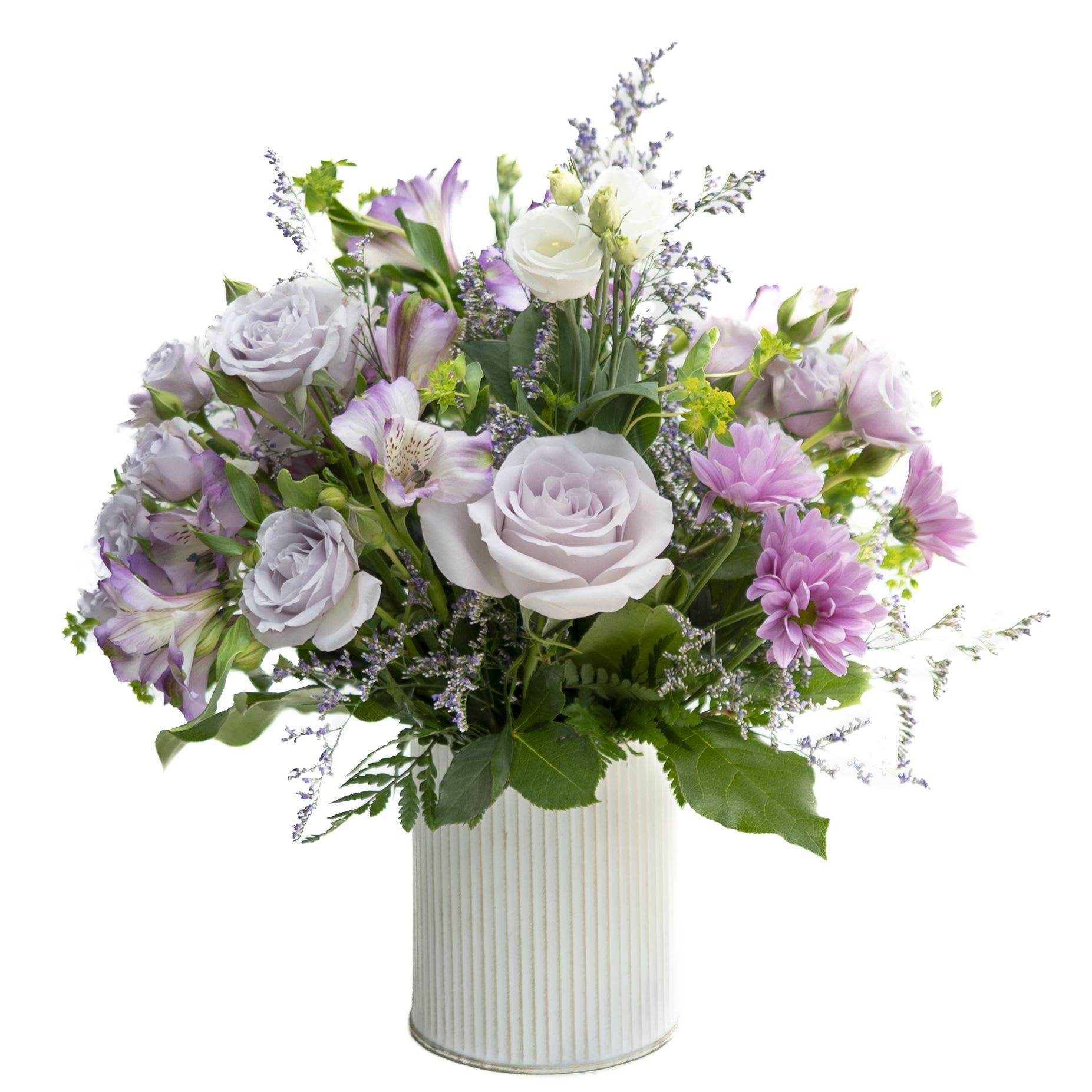 Lavender Whisper - Soft and romantic, the Lavender Whisper arrangement captures the gentle elegance of pastel blooms. Delicate lavender roses, and Spray Roses, lavender Chrysanthemums, and light lavender Alstroemeria are artfully arranged with touches of airy Limonium and lush greenery in a textured white wash metal vase. Perfect for expressing love, appreciation, or serenity, this timeless bouquet brings a graceful charm to any space. Ideal for birthdays, anniversaries, or simply brightening someone’s day.