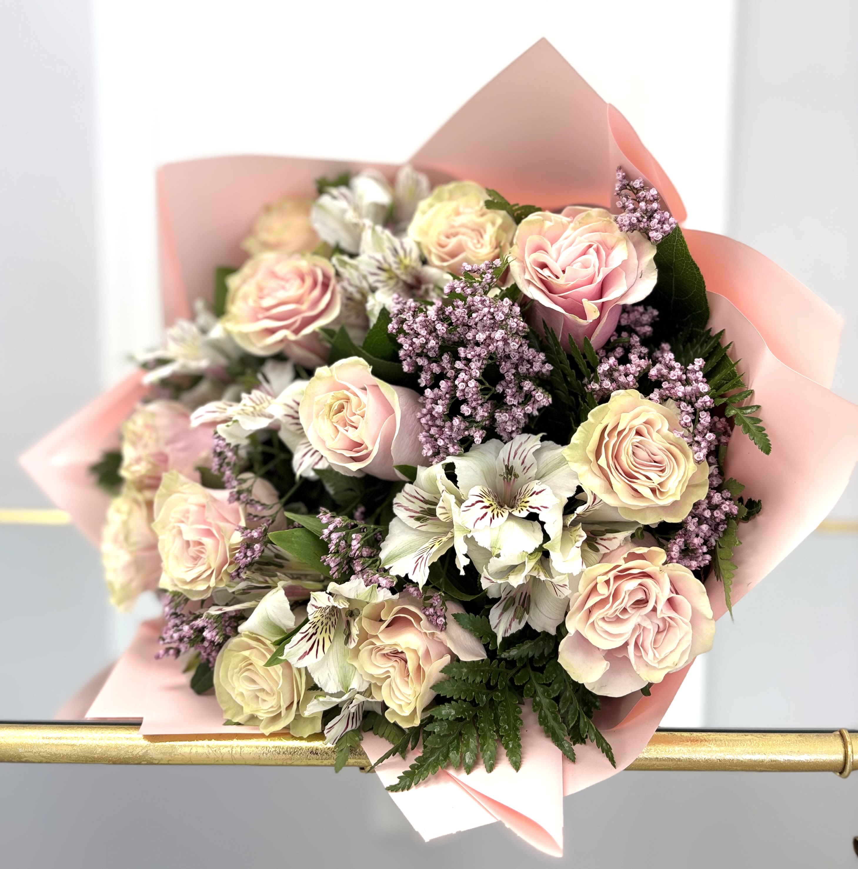 Cotton Cloud By VLM Flowers - Like a soft spring breeze, Cotton Cloud offers a gentle mix of pale roses, lilac textures, and crisp white blooms. Its airy pastel tones and light greenery create a look that's both graceful and refreshing—ideal for welcoming a new baby, saying thank you, or celebrating a tender moment