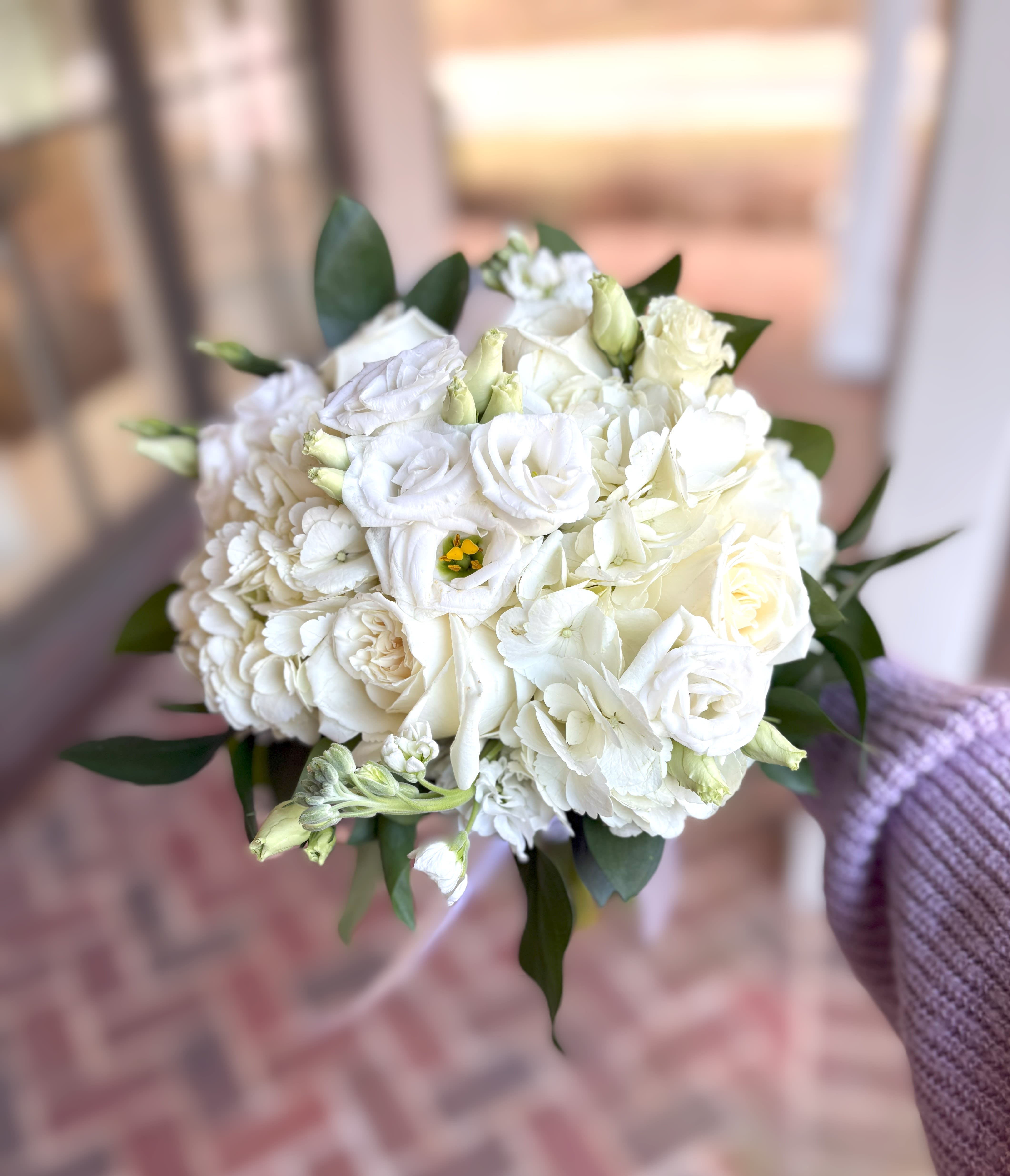 White Garden Handheld - White hydrangea, white roses and white lisianthus make an elegant and graceful bouquet.  Tax free. Same day hand delivery.  We are a local florist in Wilmington, Delaware that provides the best delivery of fresh flowers on the same day. We also offer next day delivery. Our flower shop services the Wilmington and Newark Delaware areas as well as south eastern PA. We are a flower shop near you that is tax free and provides hand delivered flowers. We offer funeral, sympathy, anniversary, birthday, holiday, Mother's Day, Valentine's Day and rose arrangements and flowers for all occasions. Petals is a full service florist that offers the best online flowers and fresh flower arrangements. You can send flowers from our flower shop to Wilmington, New Castle, Newark, Hockessin, Chadds Ford, Kennett Square and other local cities near us. 