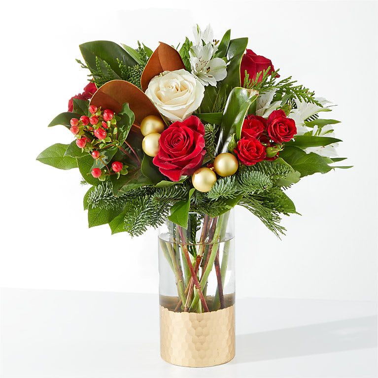 Joy &amp; Jolly Bouquet - Spread joy this holiday season with a shimmering arrangement of roses, alstroemeria, and the incredible scent of seasonal greens in unique vase. 