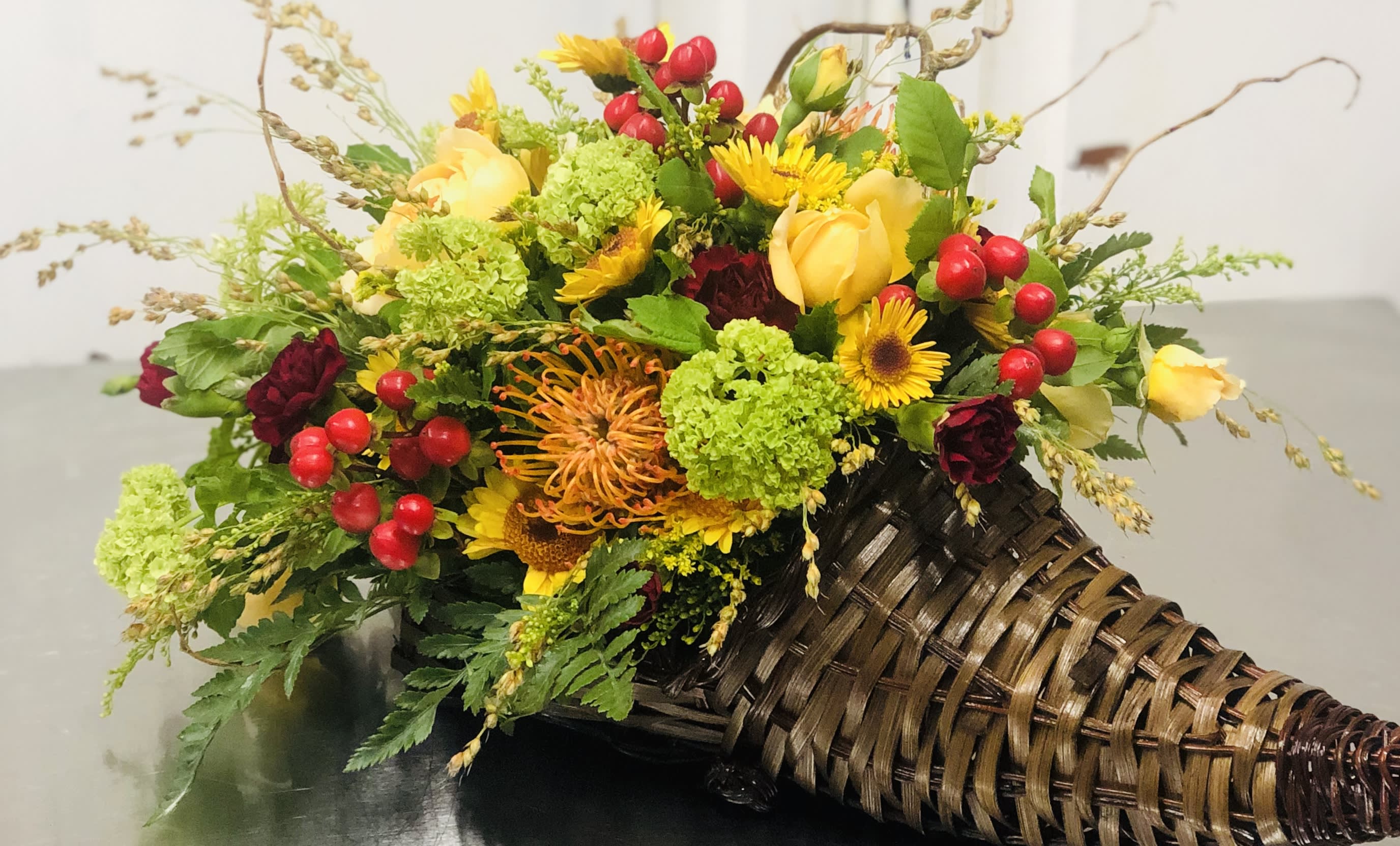 Bountiful Harvest Bountiful Harvest - This Bountiful Cornucopia is spilling over with cheery fall flowers in splendid display of colors, and textures that bring the sheer beauty of the fall season indoors. If this doesn't say Happy Thanksgiving to your loved one, nothing will. ~ ~ Happy Thanksgiving! ~ ~ ~~Limited quantities available.~~ ***NOTE***Place orders as soon as possible to ensure we have you covered