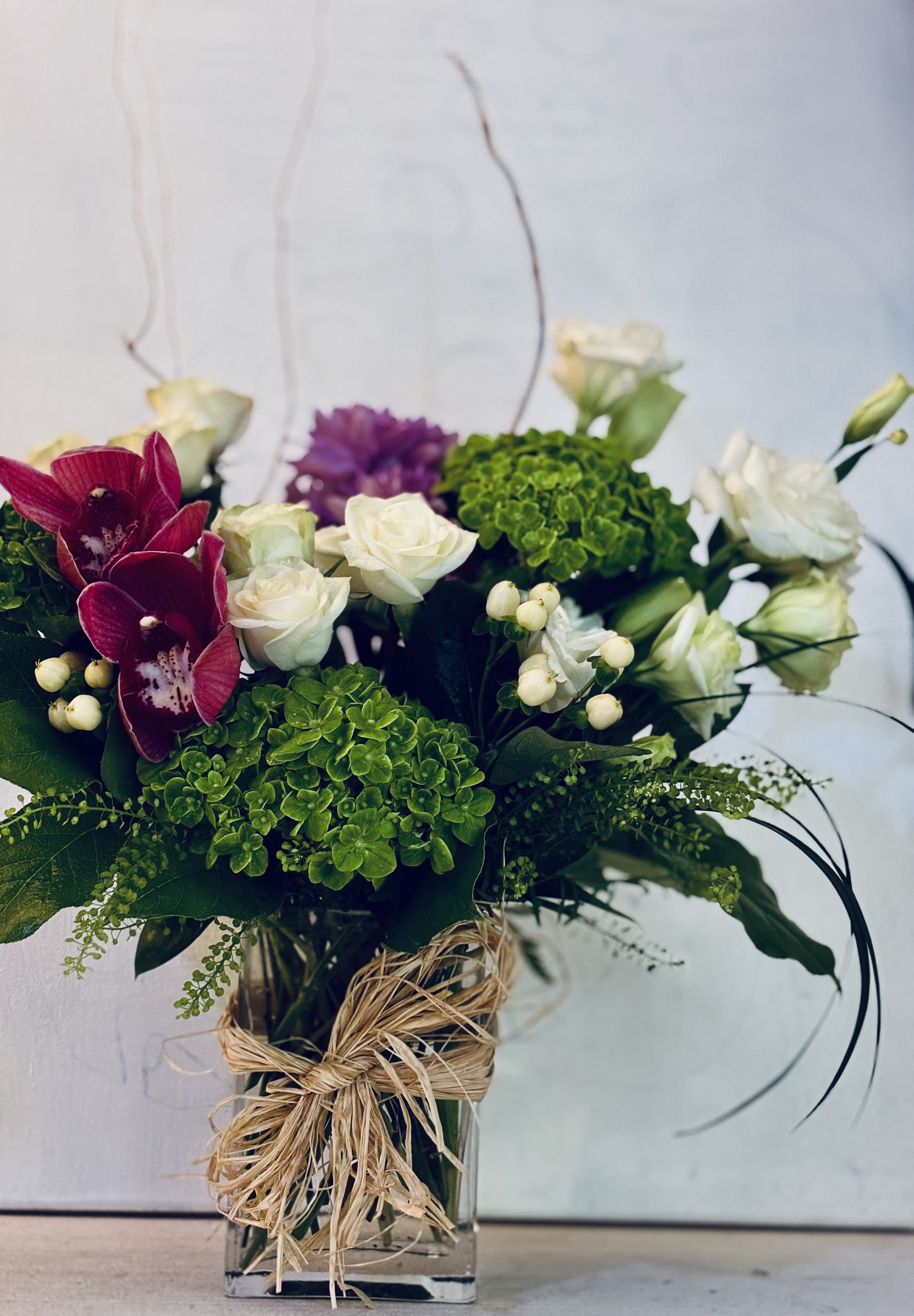 My Favorite by Moni - Hydrangeas, spray roses, Cymbidium flower, willows, any touch of purple or you favorite color. 