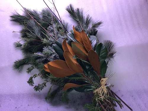 Holiday Greens - A mixture of all your favourite holiday greens:  Pine, Fraser fir, Cedar, magnolia tips and Willow branches for your do it yourself Holiday projects.  Bouquet will be delivered approximately as pictured.