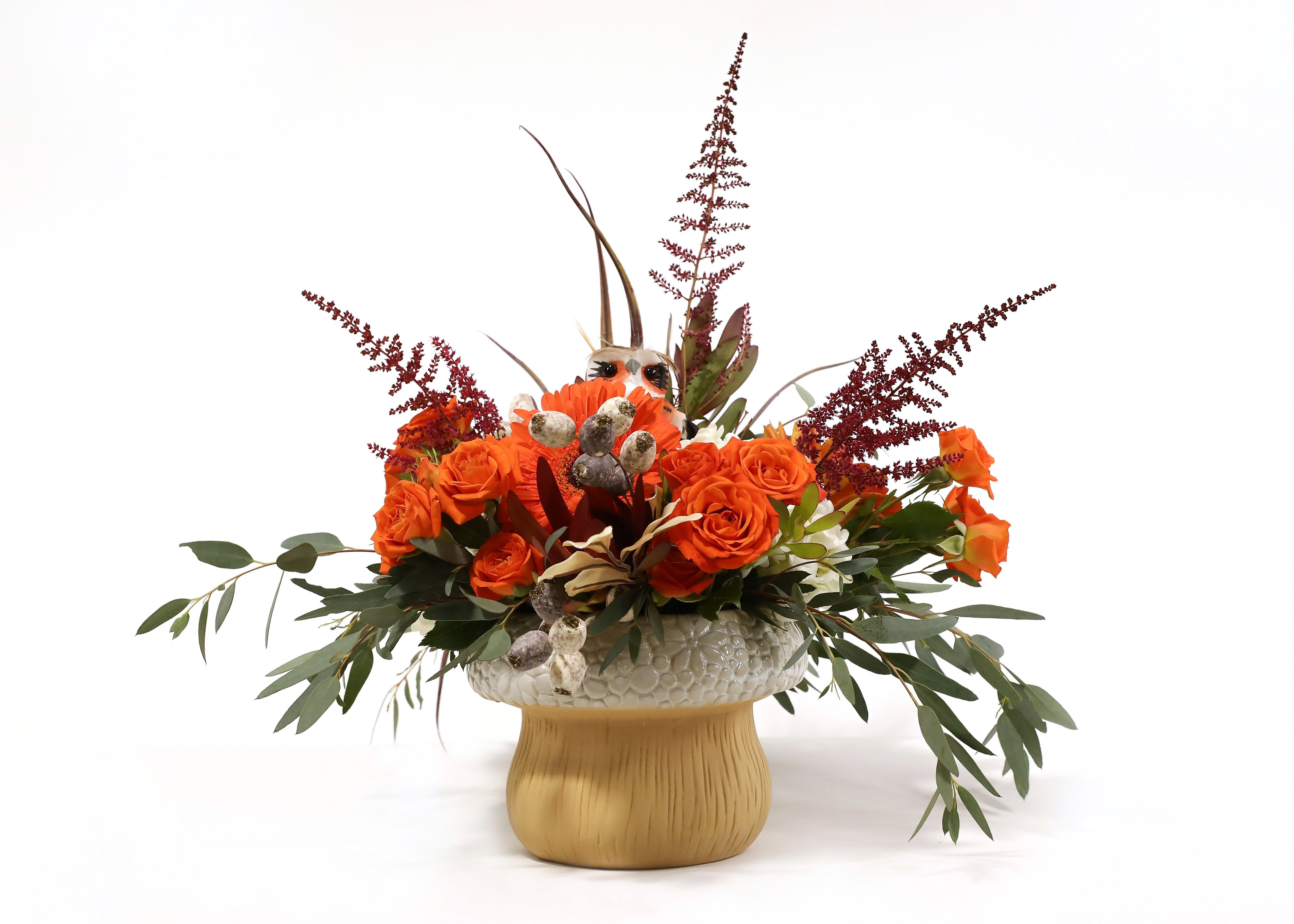 MUSHROOM MAGIC MUSHROOM MAGIC - THIS ADORABLE CERAMIC MUSHROOM POT SALYS HELLO FALL. SPRAY ROSES, GERBERA DAISIES, ASTILBE, EUCALYPTUS, SAFARI SUNSET. WE FINISHED IT OFF WITH SOME FAUX AUTUMN DECORATIONS. IF YOU LOOK CLOSE ENOUGH YOU'LL EVEN SEE A LITTLE OWL TUCKED IN THE FLOWERS.