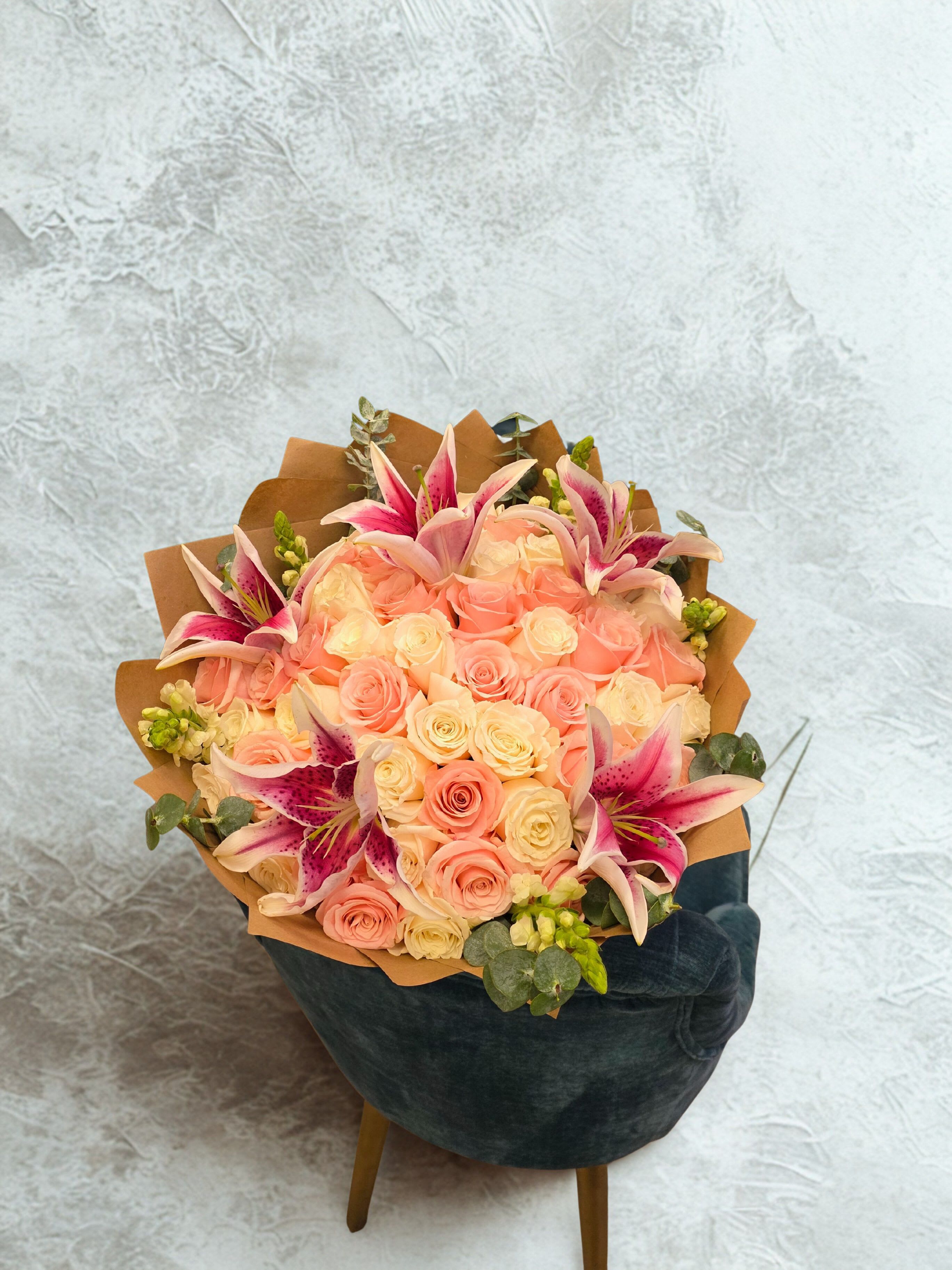 All the stars All the stars - A stunning statement of elegance — featuring 40 fresh roses in shades of white and pink, beautifully accented with 5 radiant stargazer lilies, delicate snapdragons, and fresh eucalyptus for a soft, refreshing touch. This bouquet overflows with romance and sophistication — perfect for special occasions, heartfelt gifts, or simply to say “you’re loved.” Each arrangement is wrapped in your choice of colored paper, allowing you to personalize the look — from soft pastels to bold luxury tones. Every detail is designed to let the flowers speak from the heart.
