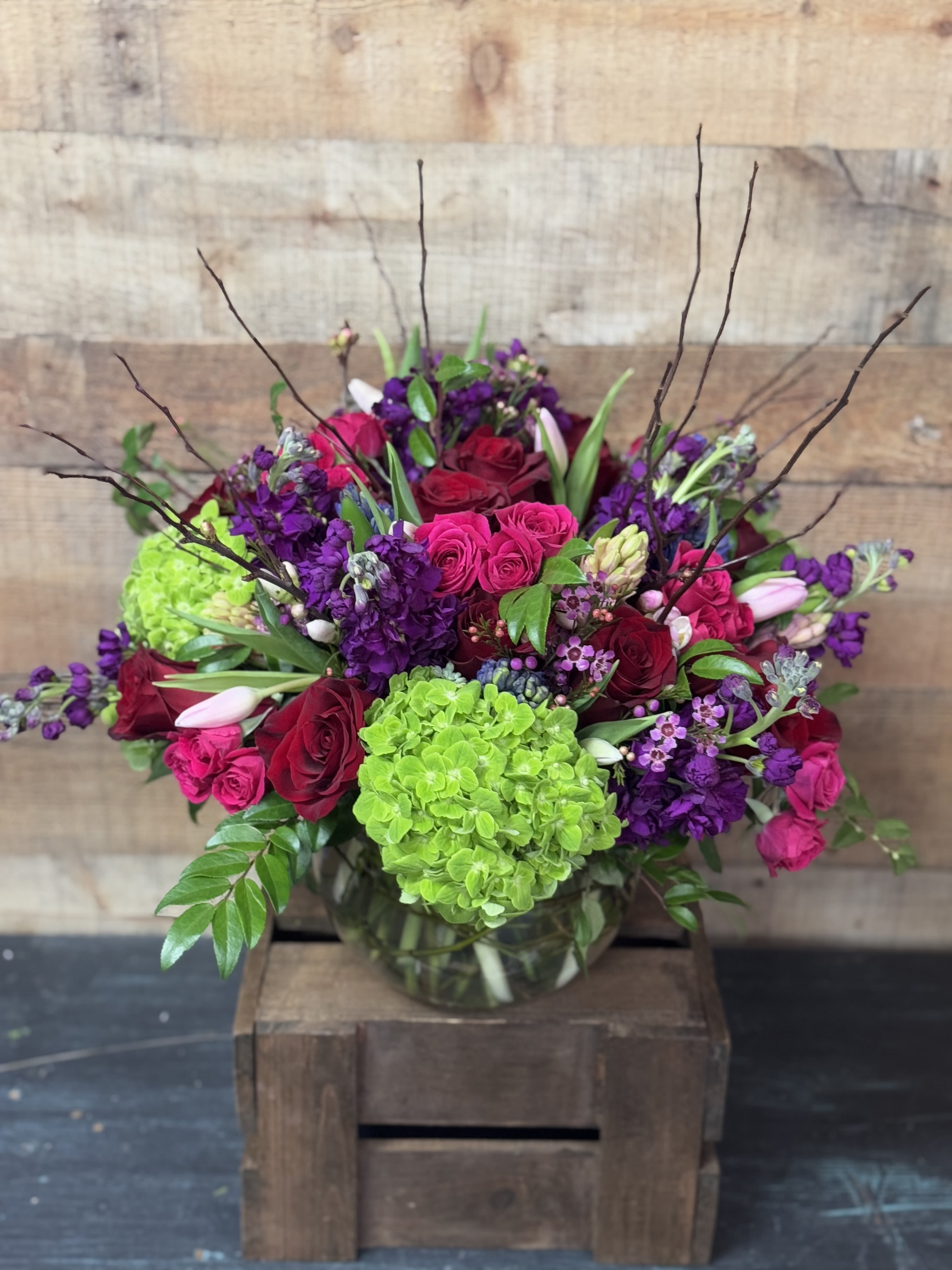 Bold and Beautiful Bold and Beautiful - A beautiful arrangement in vibrant colors and a variety of flowers including roses, spray roses, tulips, hydrangeas, stock, and hyacinth (when in season)