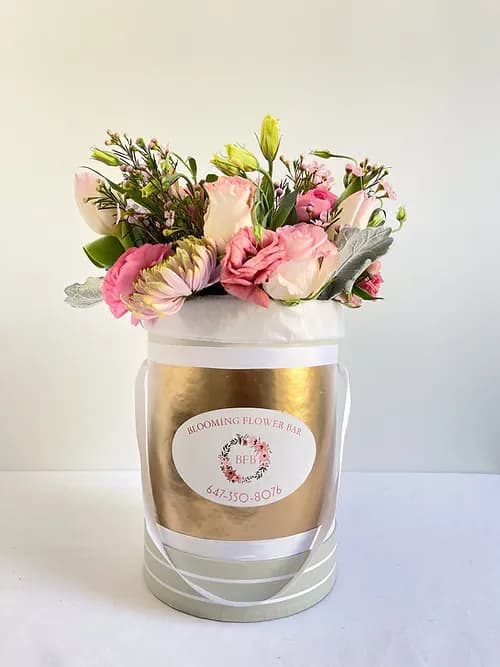 LUV Box - Available in pink, red, or white.  Our gorgeous hat box bursting with seasonal favourites says it all.   Bouquet will be delivered approximately as pictured.