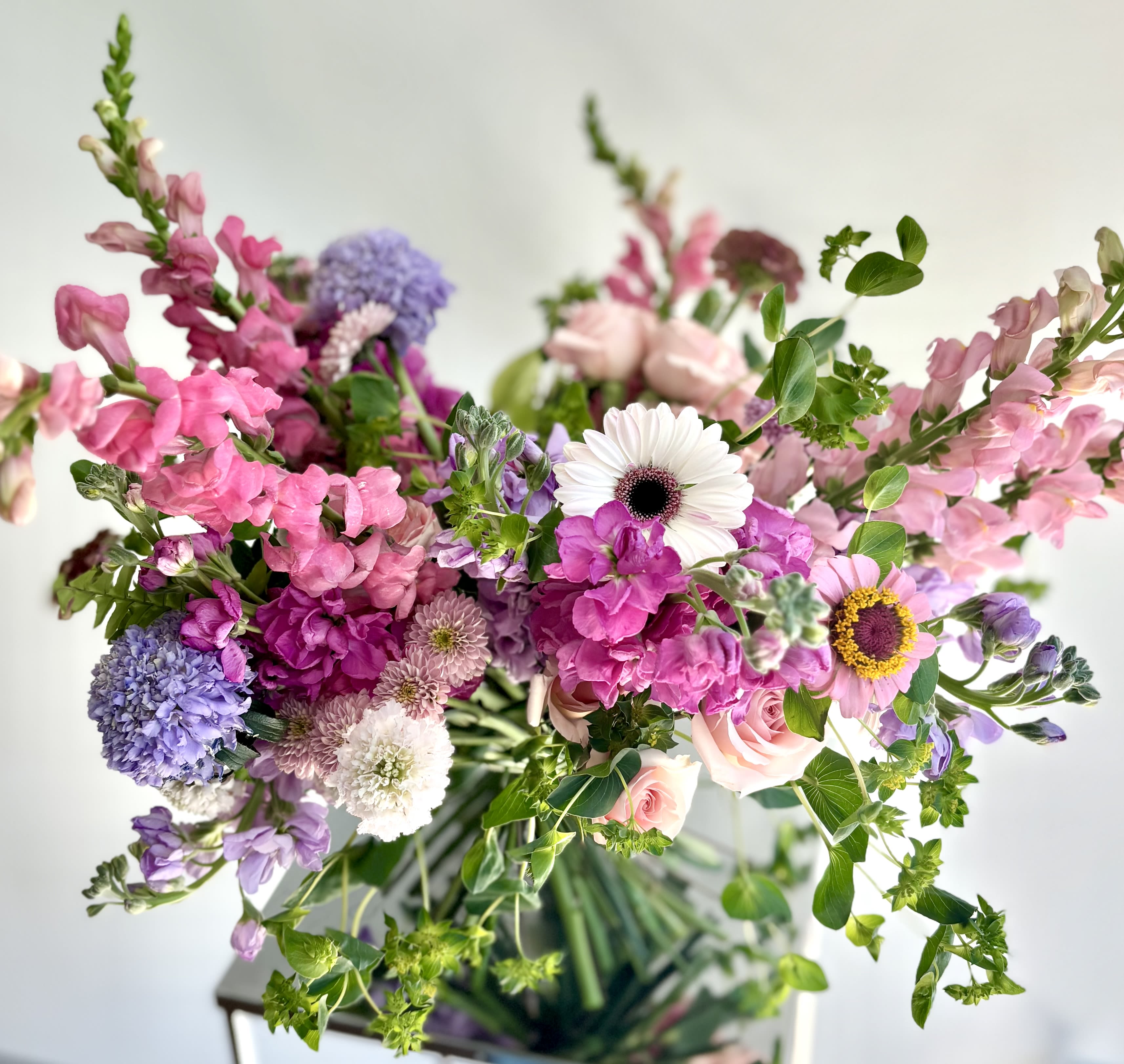 Summer Handtied Bouquet Summer Handtied Bouquet - A lovely colorful handtied bouquet (no vase provided) of premium flowers reflecting the colors of summer - bright, vibrant and happy. Michaela selects the flowers and colors to make a stunning floral gift for the recipient. Make a note if you'd like her to work with a certain color palette and she will do her best to accommodate your wish.