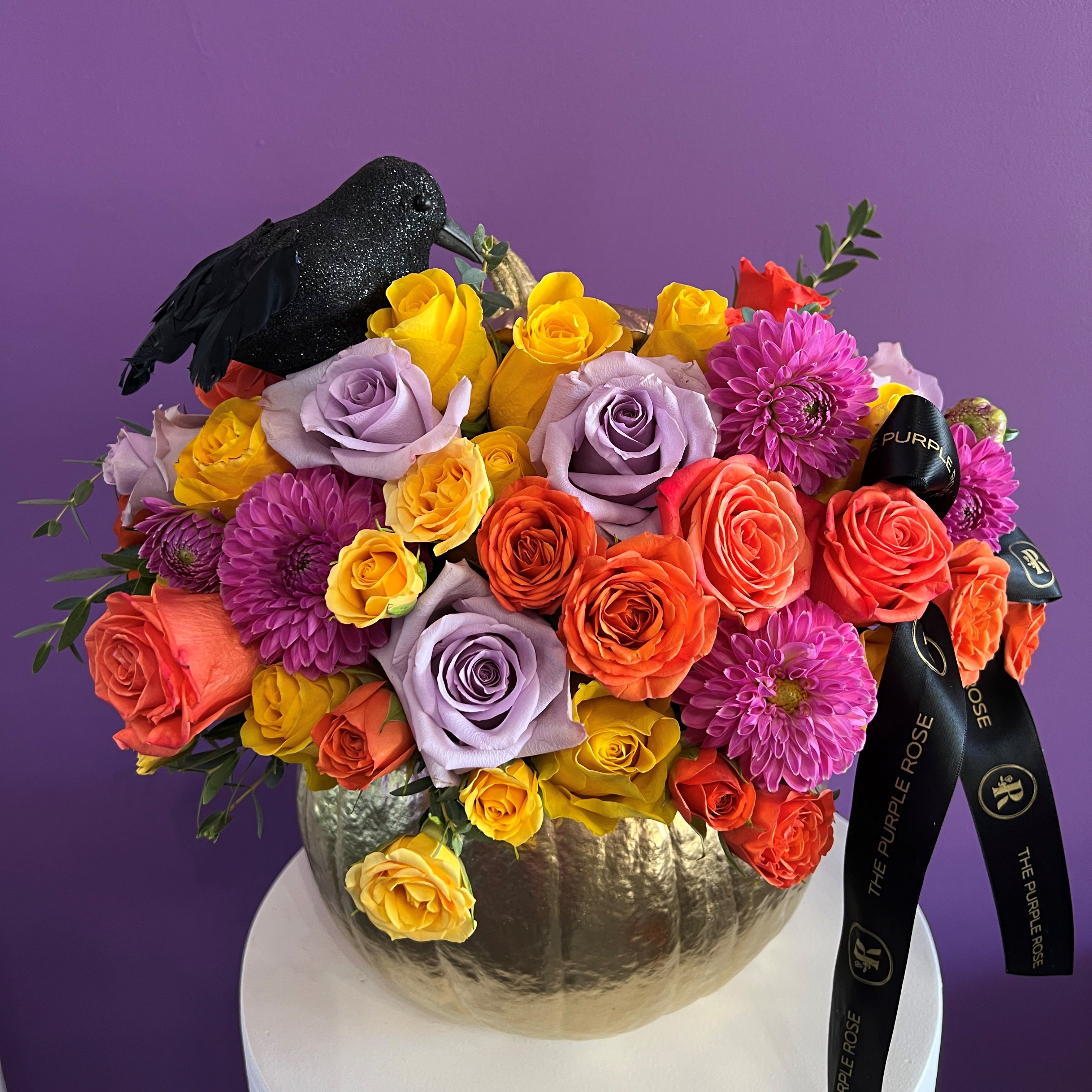 Gold pumpkin - The Gold Pumpkin makes an eye-catching centerpiece, a thoughtful holiday gift, or a touching sympathy arrangement.  Seasonal or not available flowers can be replaced with a similar one. Vases also can be replaced with others