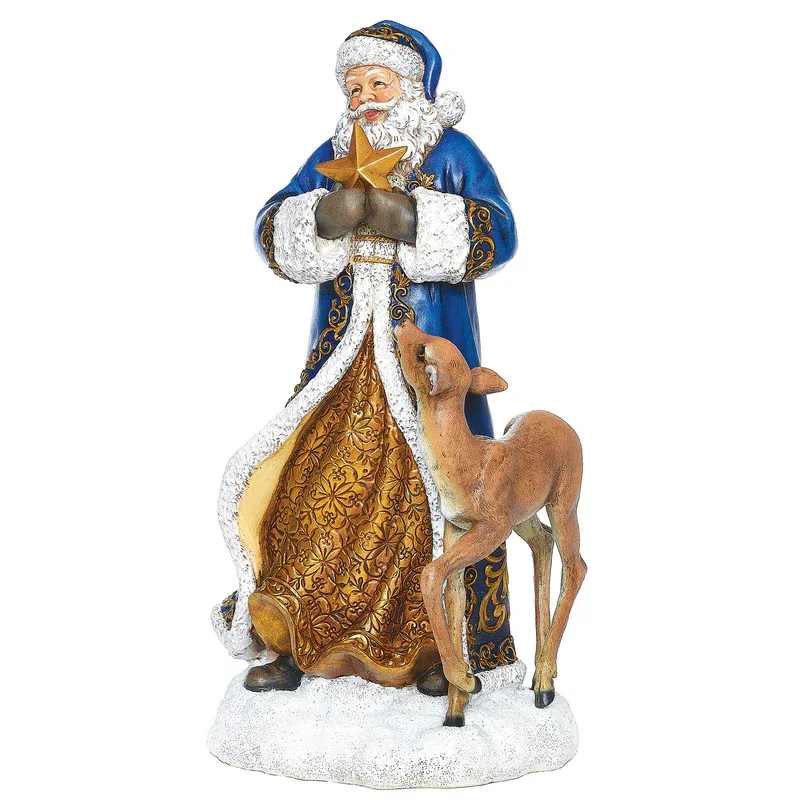 CHRISTMAS - BLUE AND GOLD SANTA WITH DEER CHRISTMAS - BLUE AND GOLD SANTA WITH DEER - From the Joseph's Studio collection, this beautifully detailed Blue Santa figure features soft winter tones and graceful styling. Holding a star and accompanied by a deer, it symbolizes guidance and serenity‚ perfect for mantels, shelves, or tabletops during the Christmas season. Material: Resin/Stone Mix Size: 11.5" H