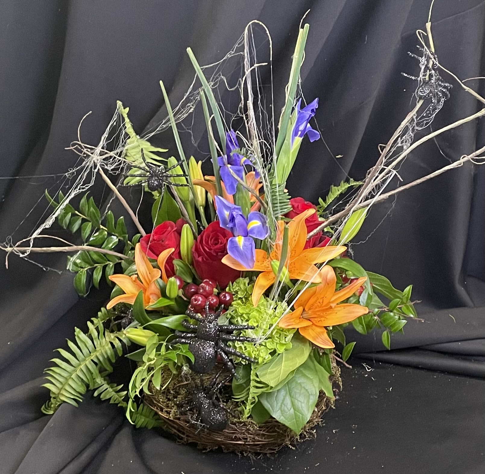 Sparkly Spiders - Fall design featuring wonderfully scary spiders spinning their web over beautiful flowers.  Light-hearted fun for Halloween available in any price range!