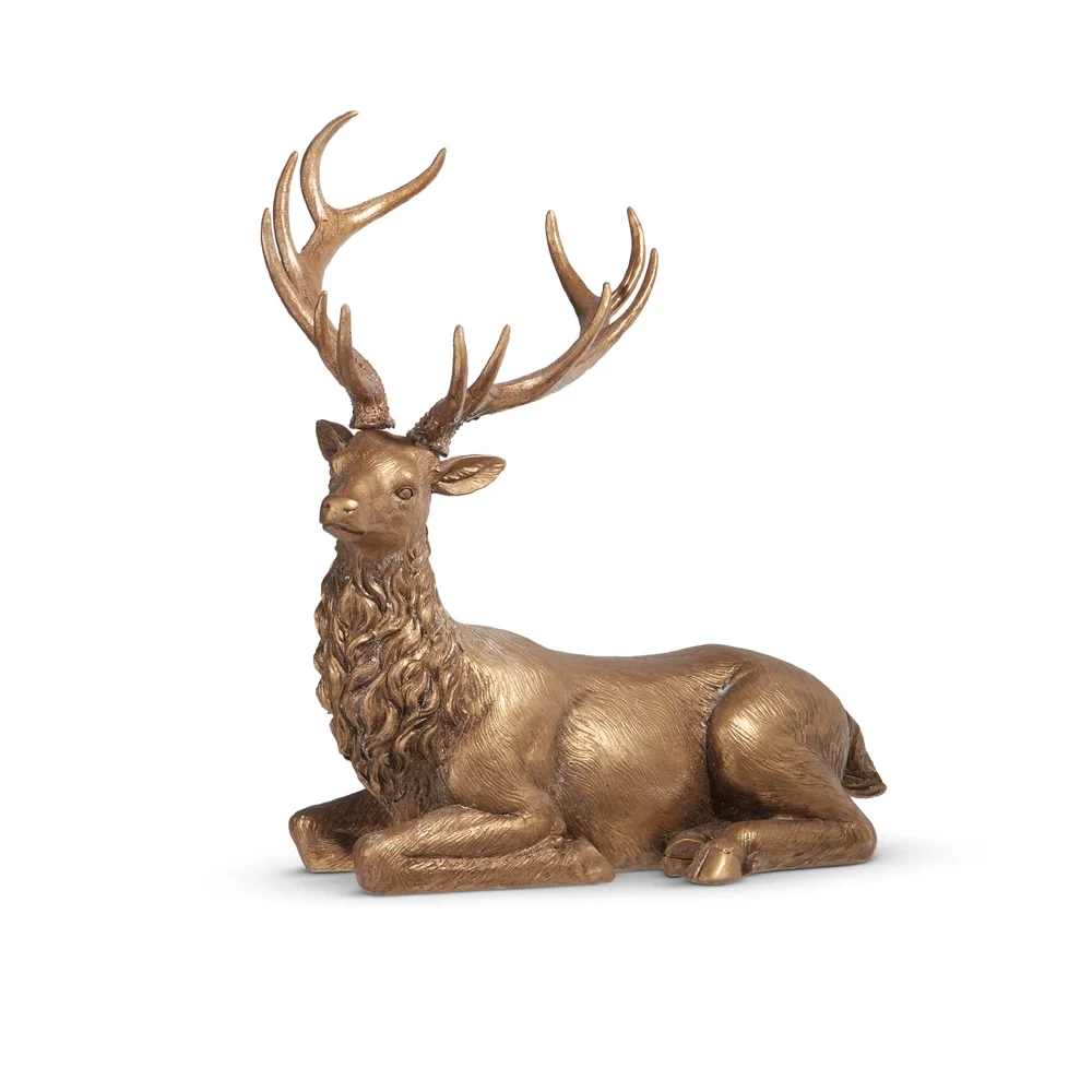 CHRISTMAS - 16" GOLD LAYING DEER CHRISTMAS - 16" GOLD LAYING DEER - Made of RESIN Measures: 15.5" L x 8" W x 16" H