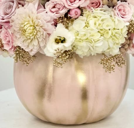 Pumpkin designer choice Pumpkin designer choice - Combine your Flower Power with Pumpkin Power with this wonderful, dare we say “powerful,” seasonal arrangement. Housed in a ceramic pumpkin vase, you will surely “fall” in love with this collection of fall flowers this fall.