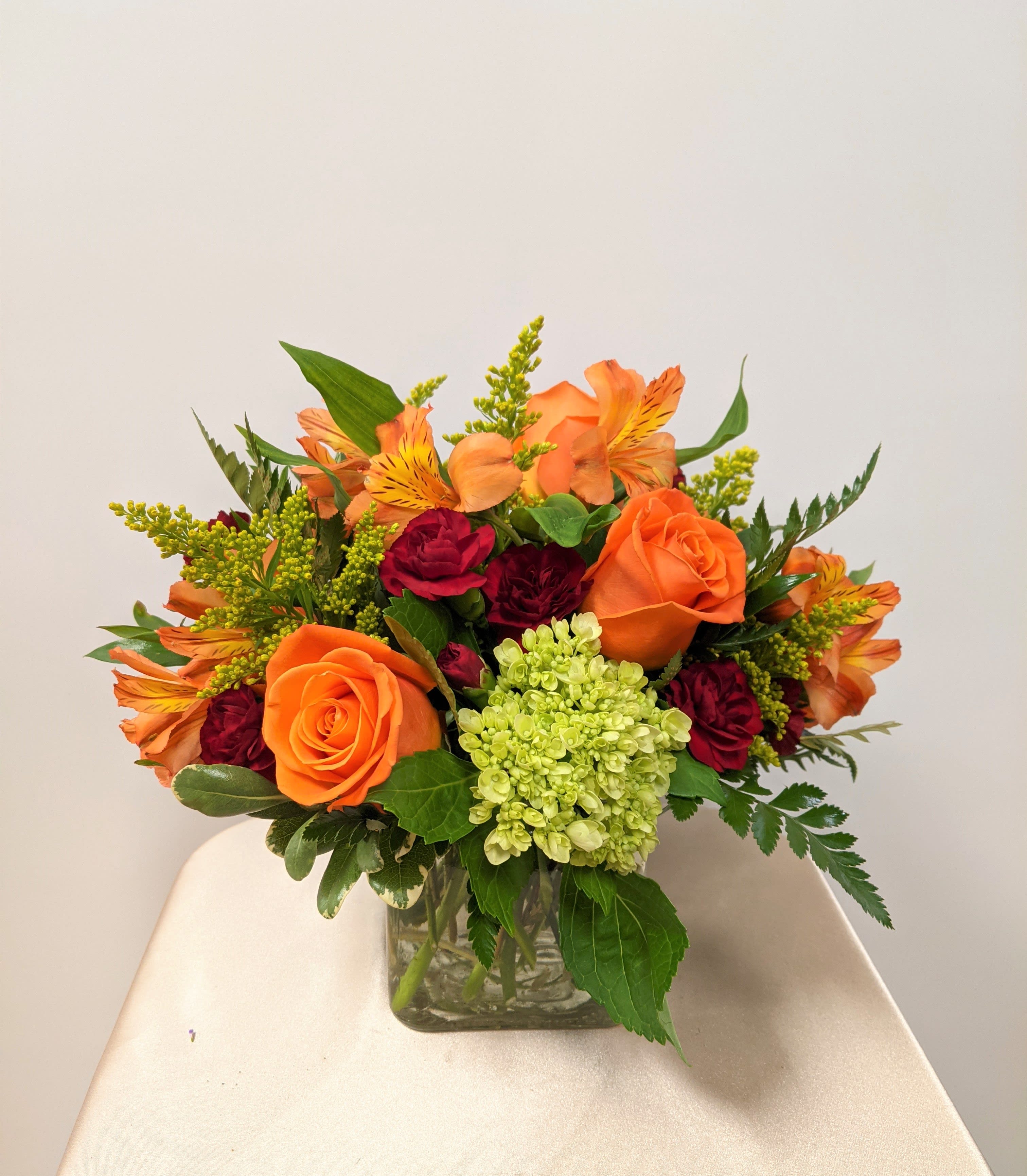 Autumn's in the Air - Autumn is definitely in the air! send this beautiful fall arrangement to someone to brighten their day a bit, with a colorful mix.