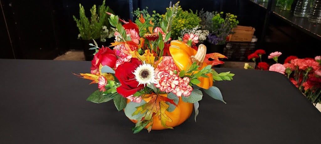 Hello Fall  - Festive arrangement in a harvest pumpkin for a beautiful fall arrangement.