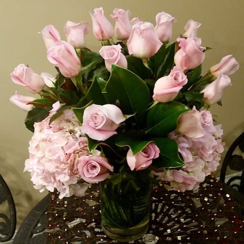 Pink roses Pink roses - Collection of 18 elegant pink roses arranged in a vase. Starting price offers a 18 stems of roses Upgrade provide editions stems. Larger size available upon request, call us at 215.563.5554.