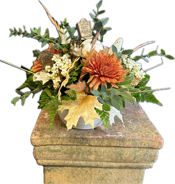 Beautifully Haunted Bouquet Beautifully Haunted Bouquet - Celebrate this October with Moss' Beautifully Haunted Bouquet. This bouquet includes seasonal fall cremones accented with lush greenery, faux pumpkin and berries with graveyard Halloween Decor.